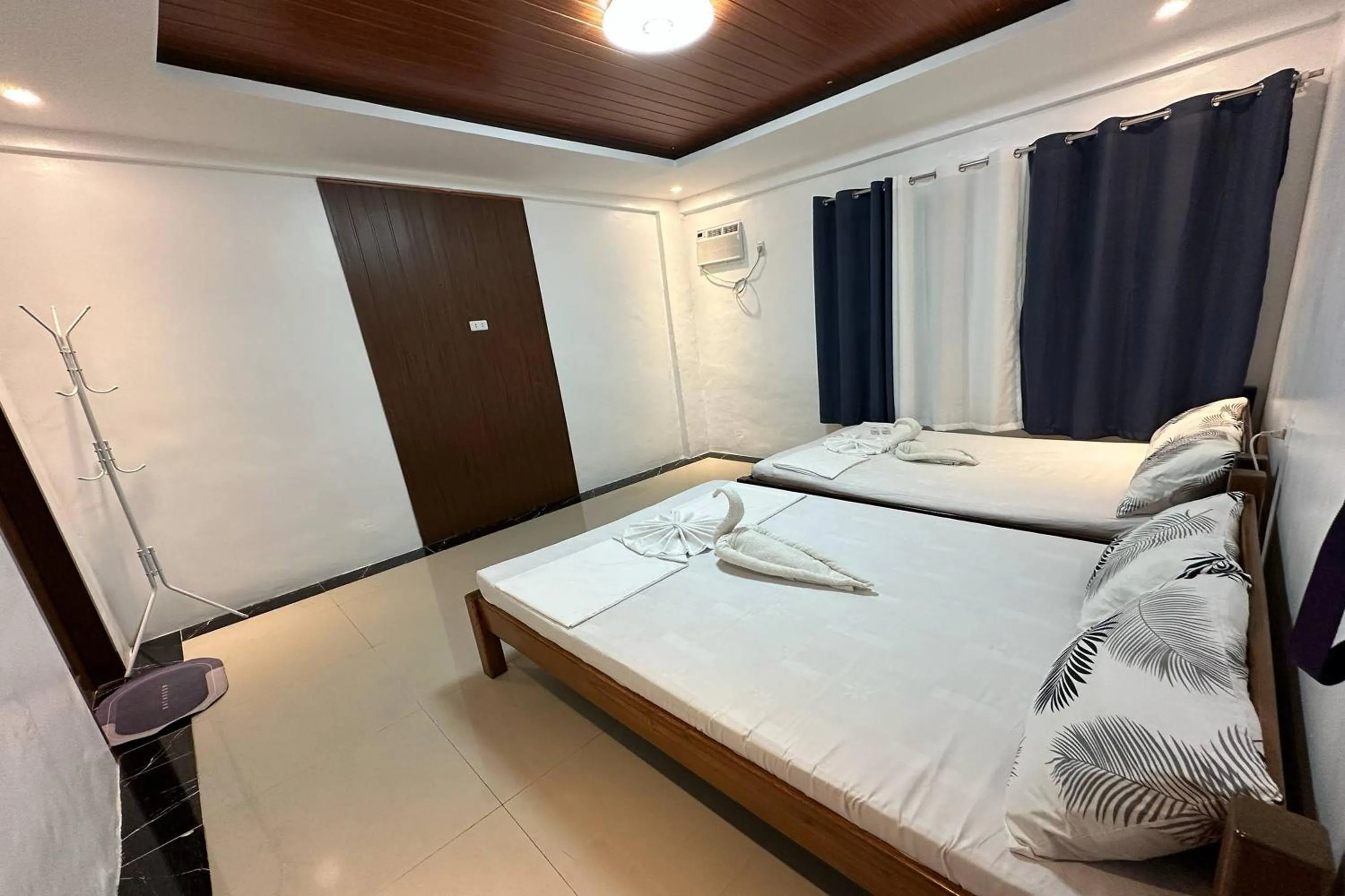 Bed in White-Beach Hideaway Resort Puerto Galera