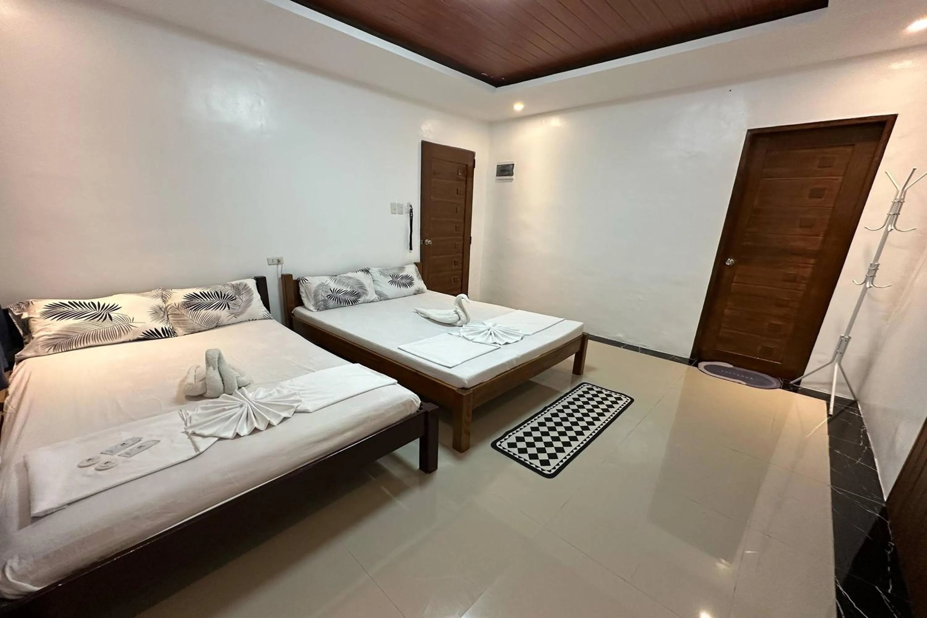 Bed in White-Beach Hideaway Resort Puerto Galera