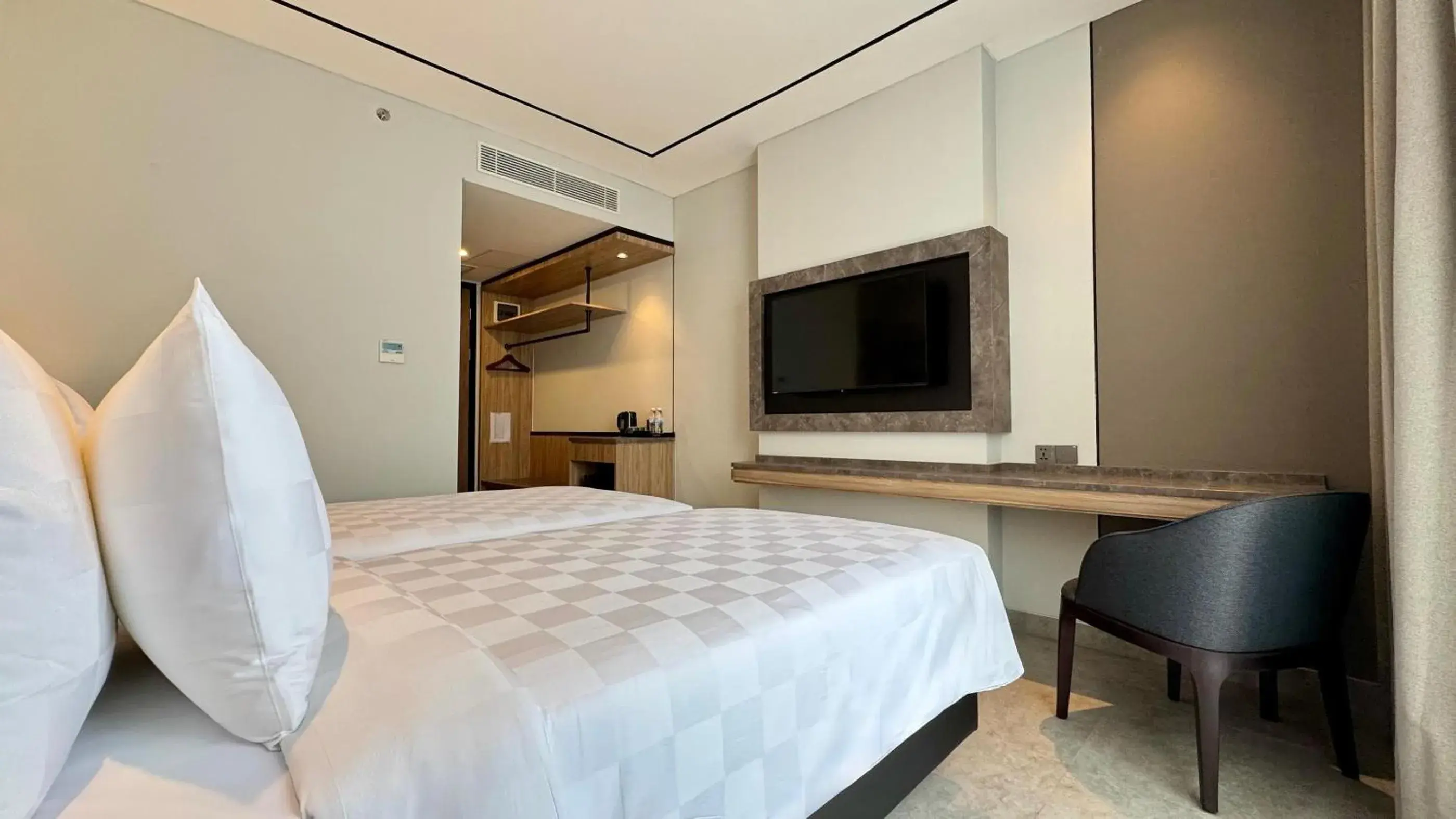 Deluxe Twin Room in Azana Boutique Bandar Lampung Deluxe Twin Room in Azana Boutique Bandar Lampung