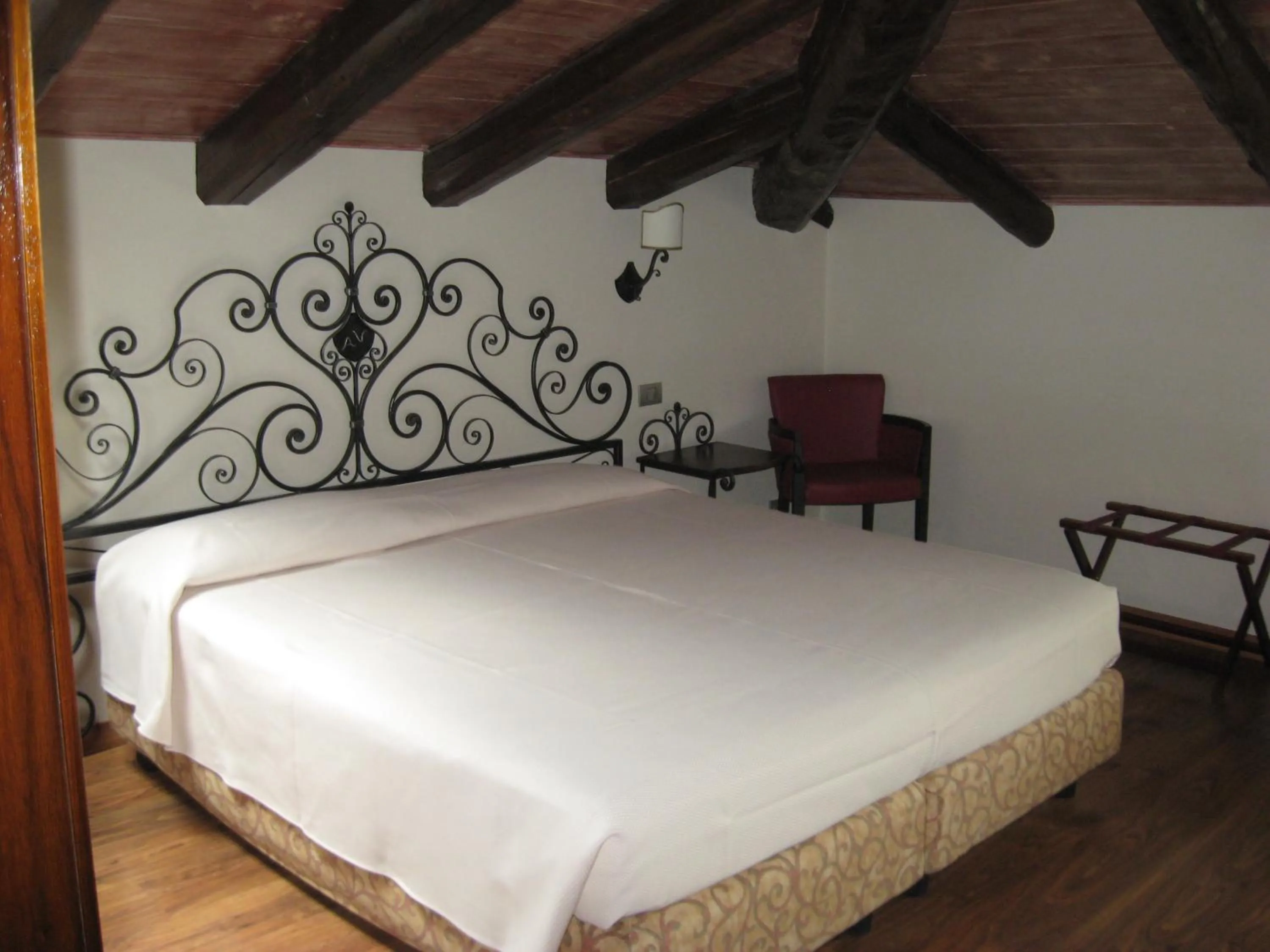 Bed in Albergo Venturelli