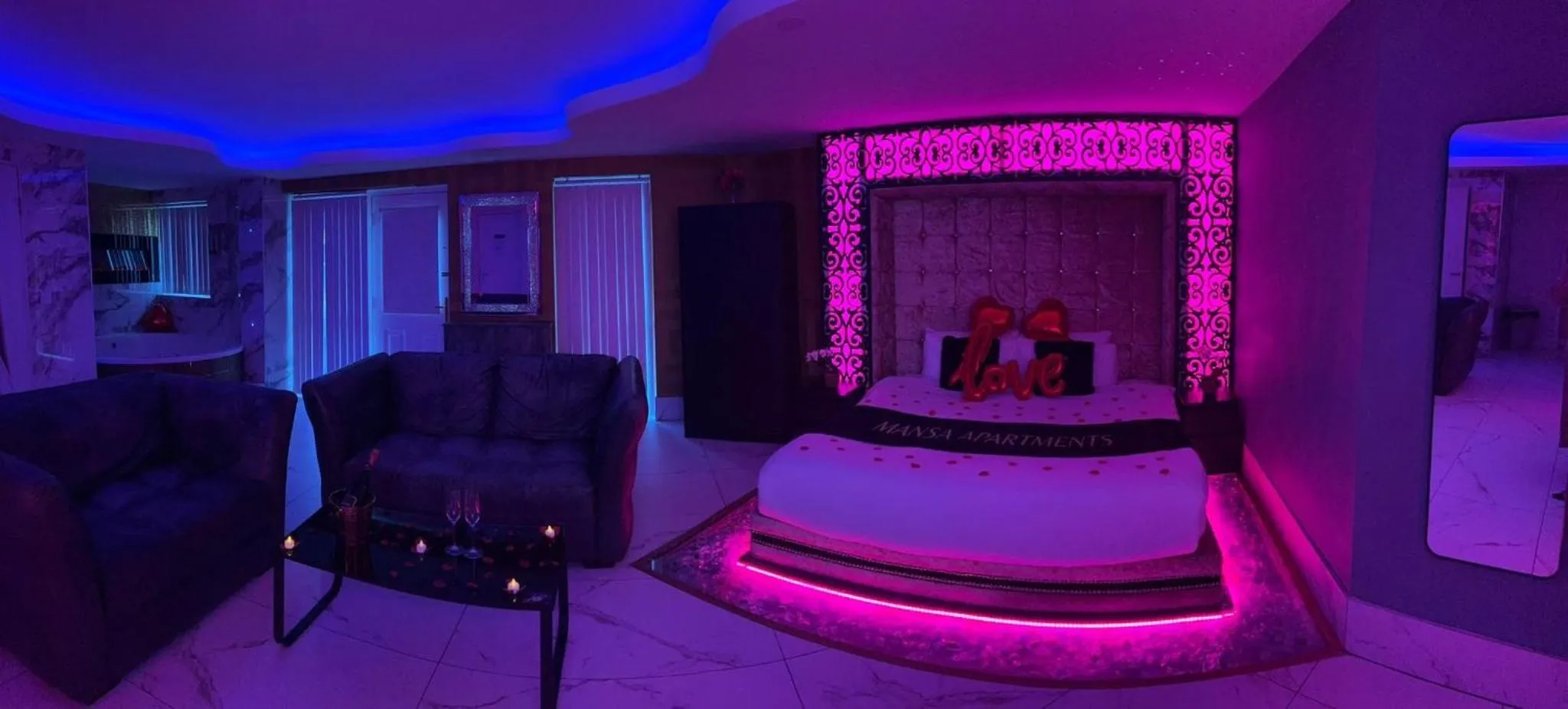 Living room, Bed in Mansa Apartments