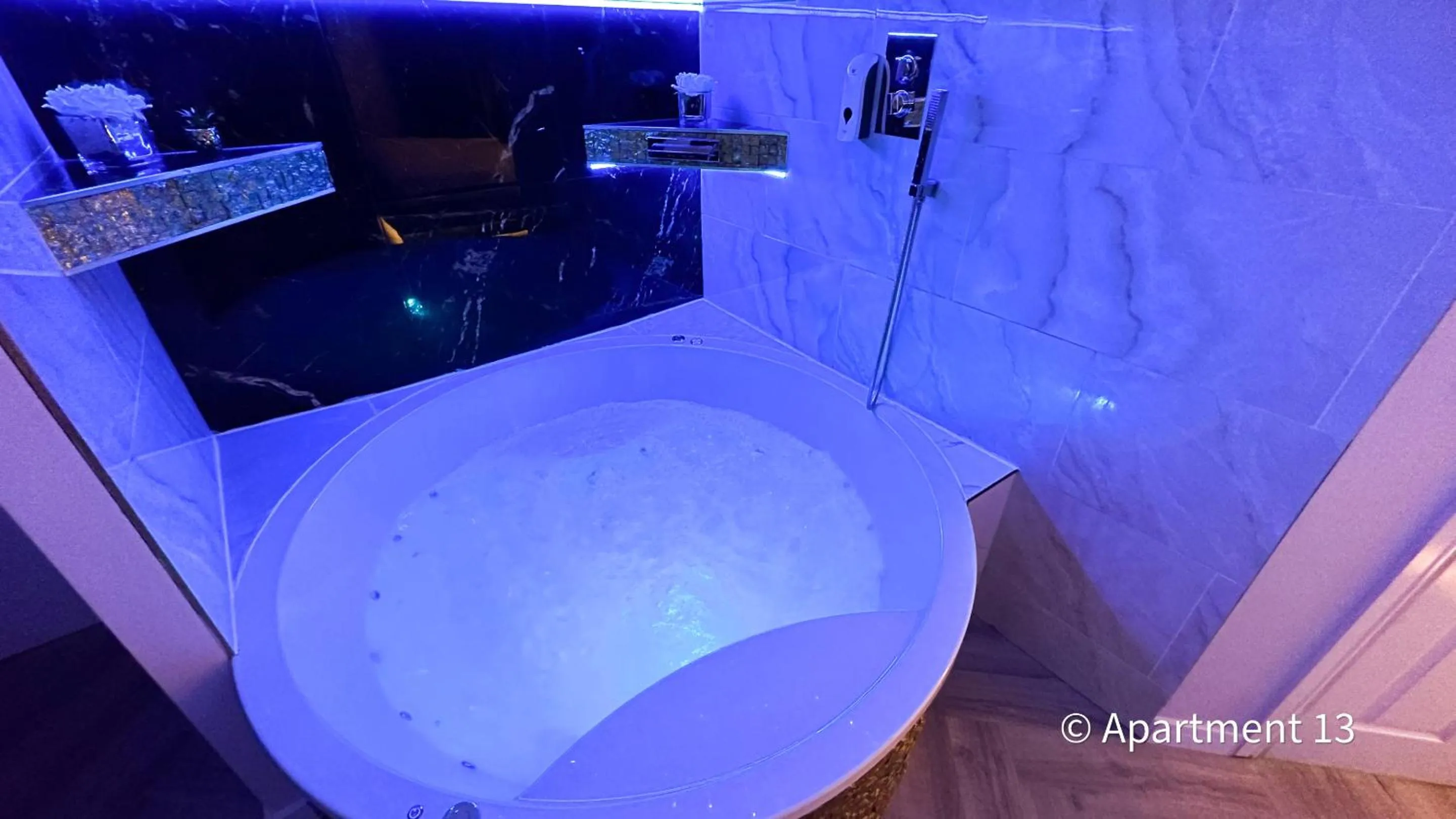 Hot Tub in Mansa Apartments