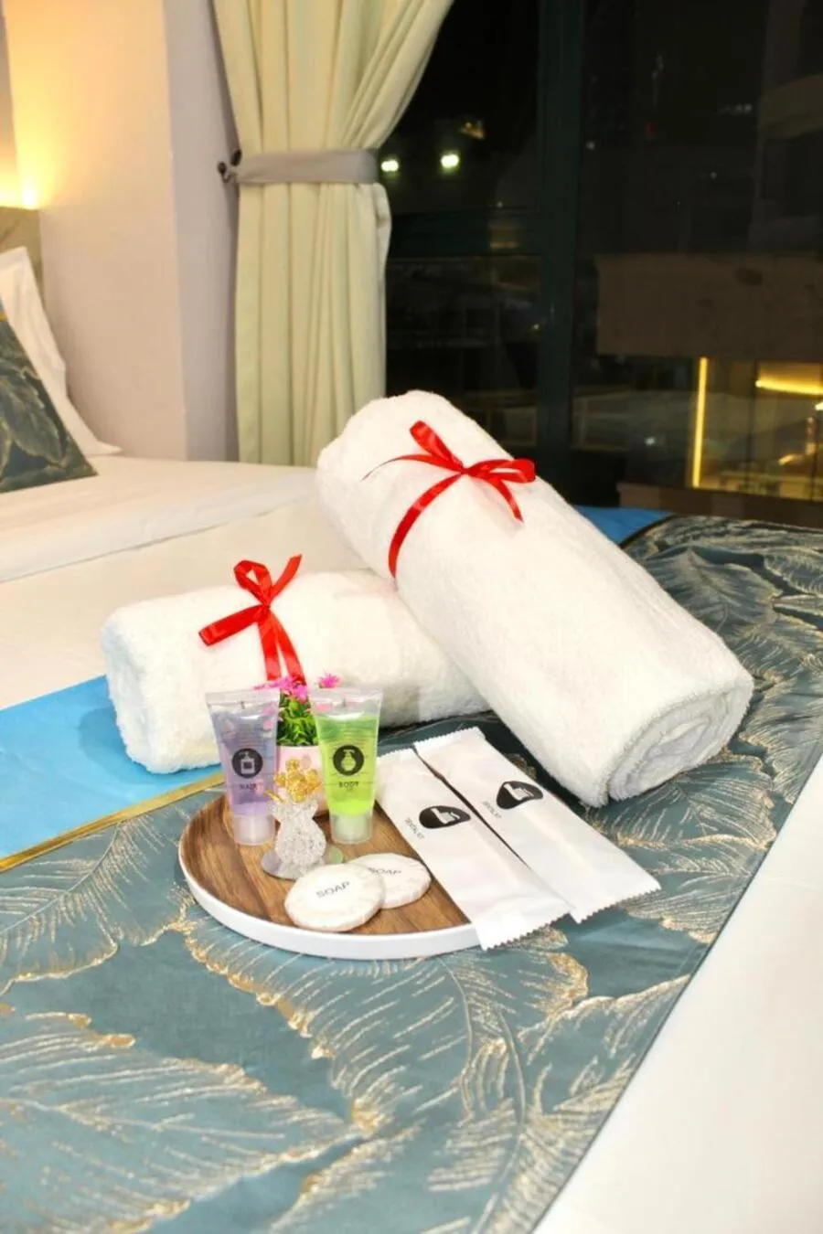 towels, Bed in AQ Hotel Bukit Bintang
