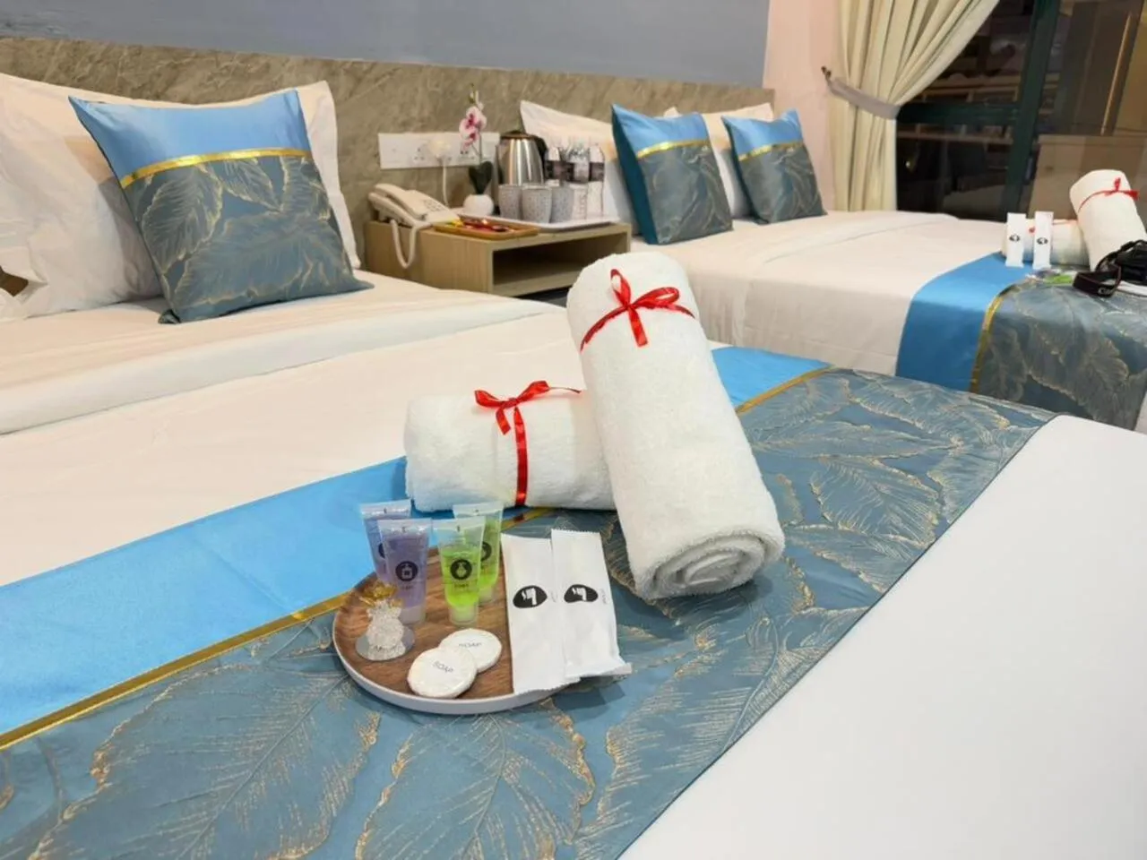 towels, Bed in AQ Hotel Bukit Bintang