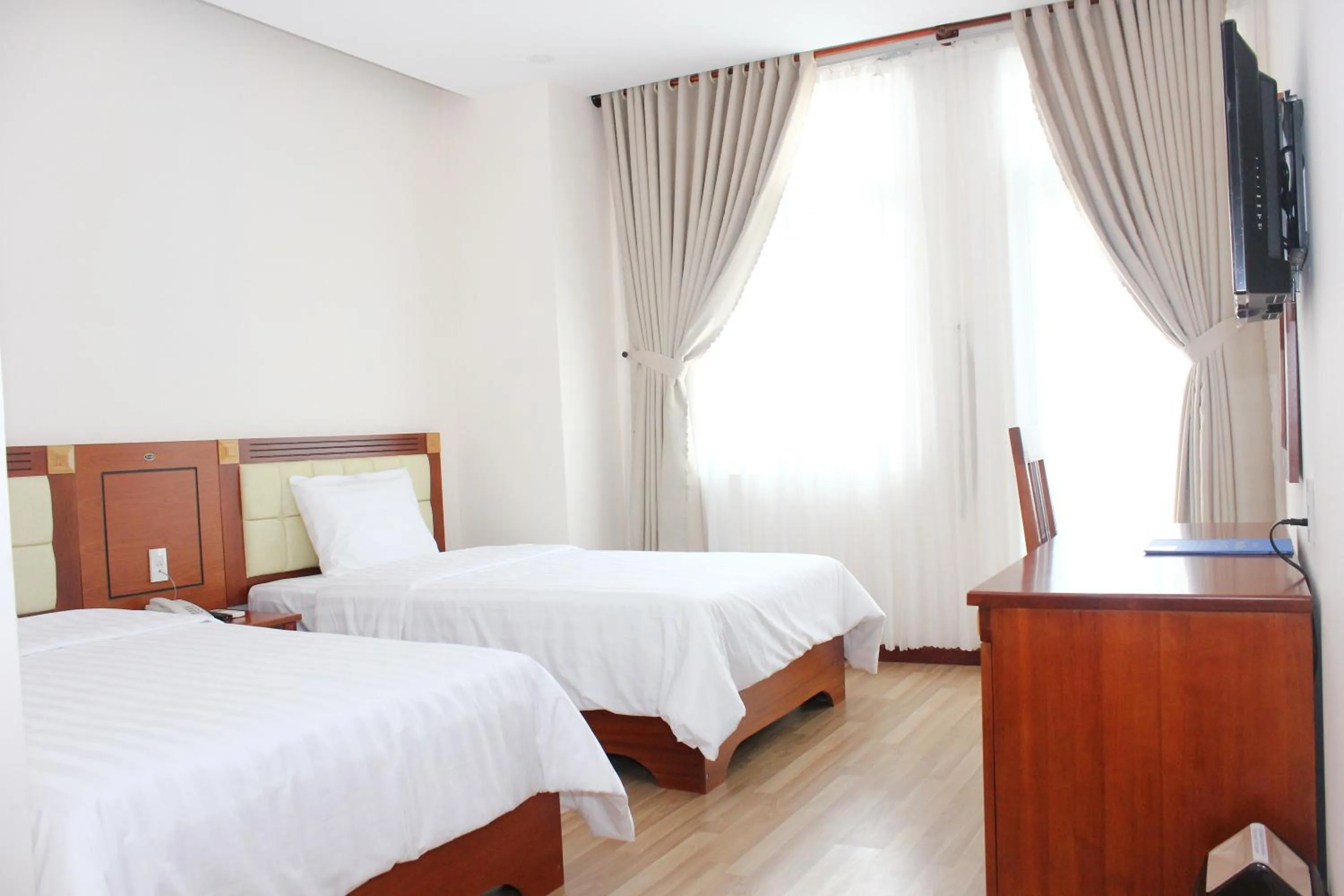 Photo of the whole room, Bed in Hoang Ngoc Hotel
