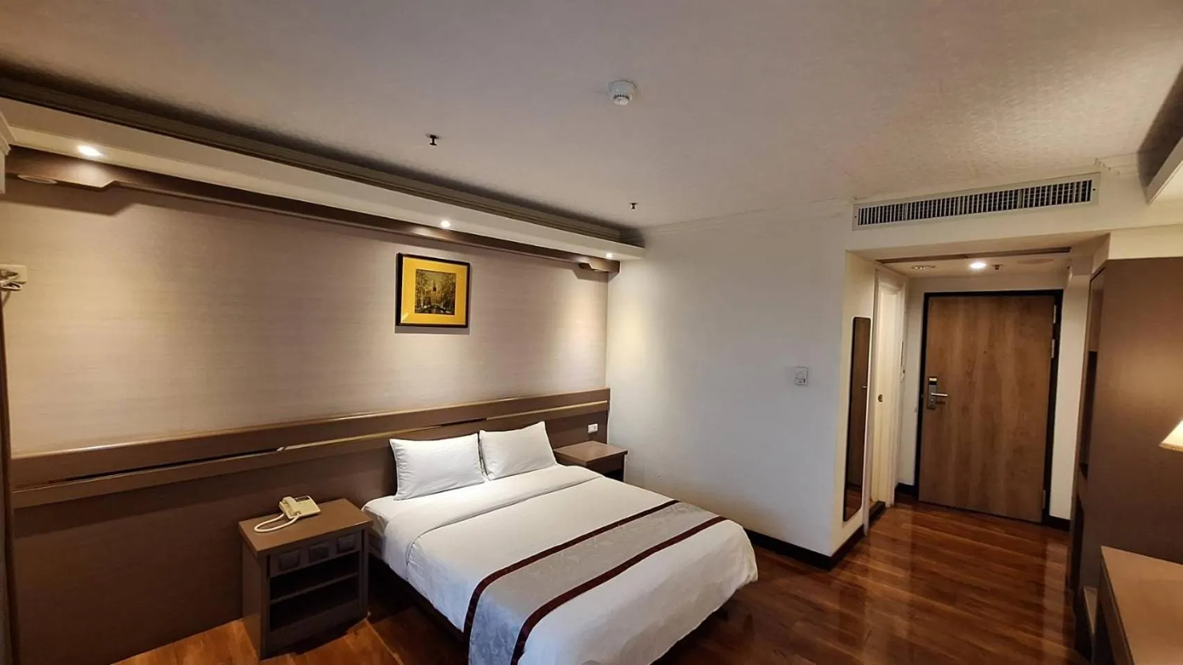 Bed in Cheng Pao Hotel