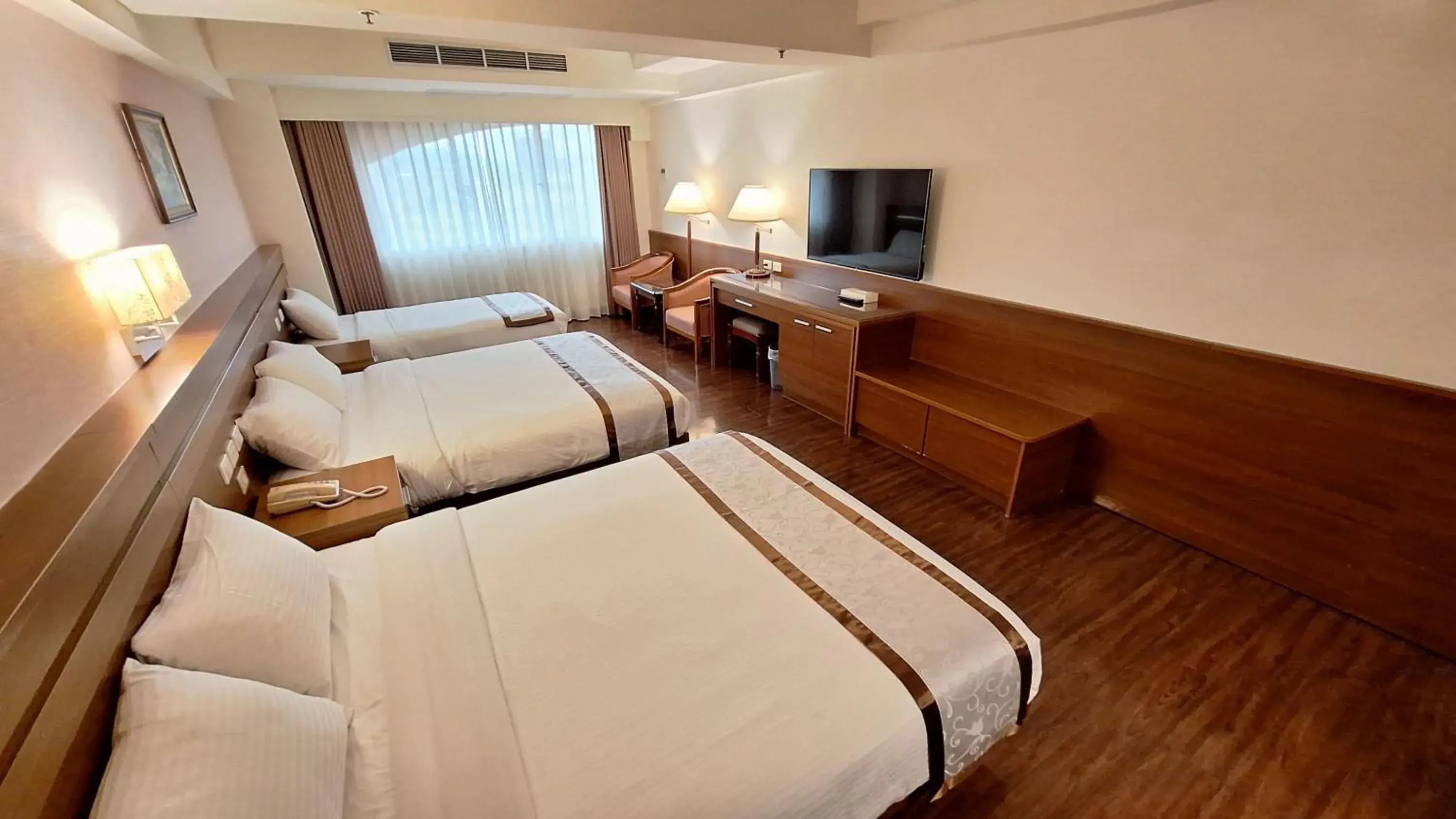 Bed in Cheng Pao Hotel Bed in Cheng Pao Hotel