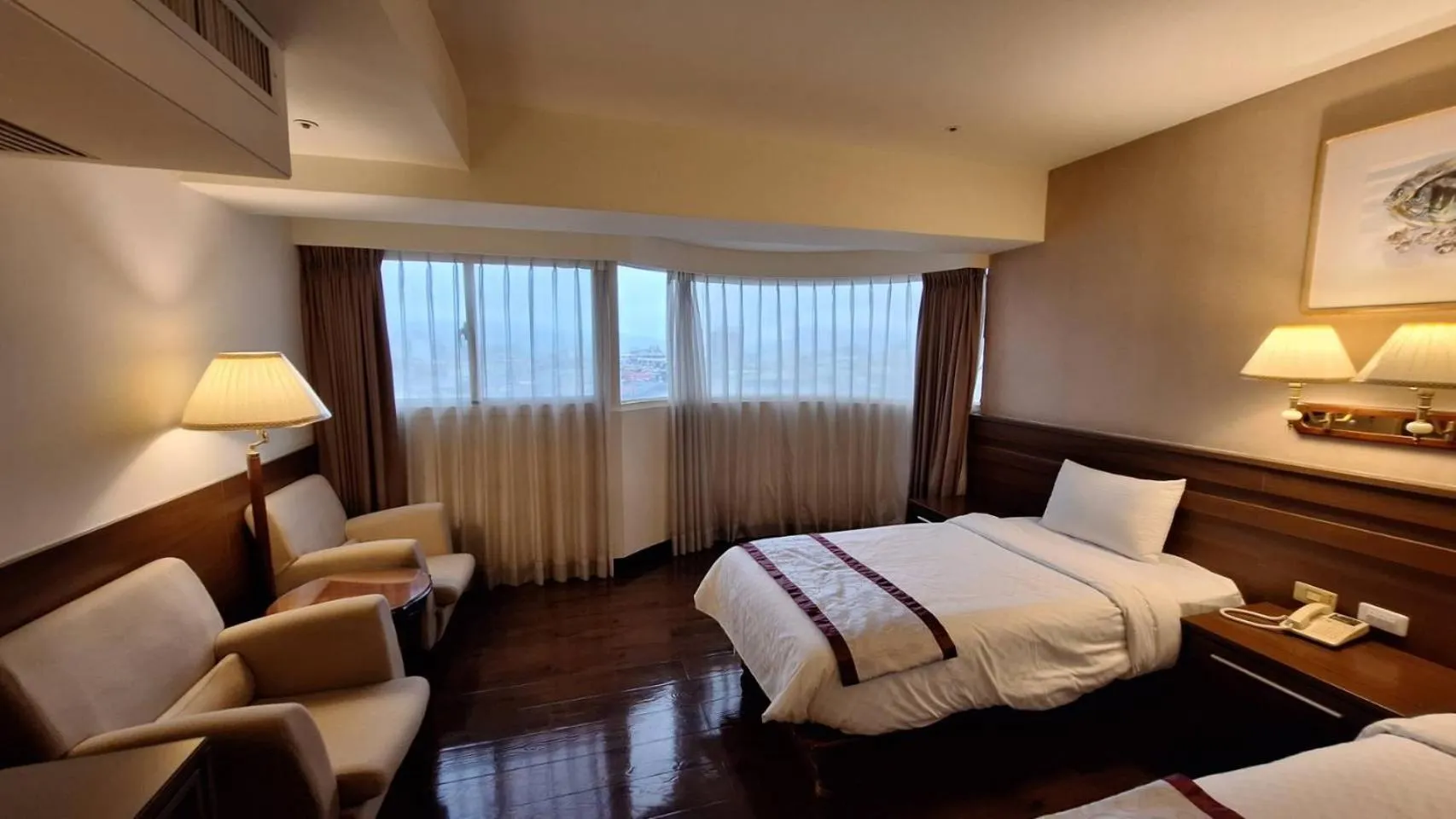 Bed in Cheng Pao Hotel