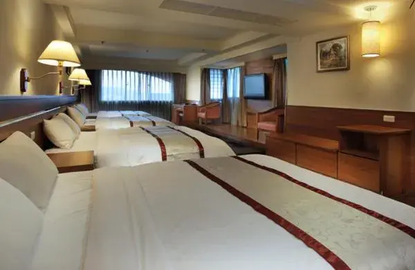 Bed in Cheng Pao Hotel Bed in Cheng Pao Hotel