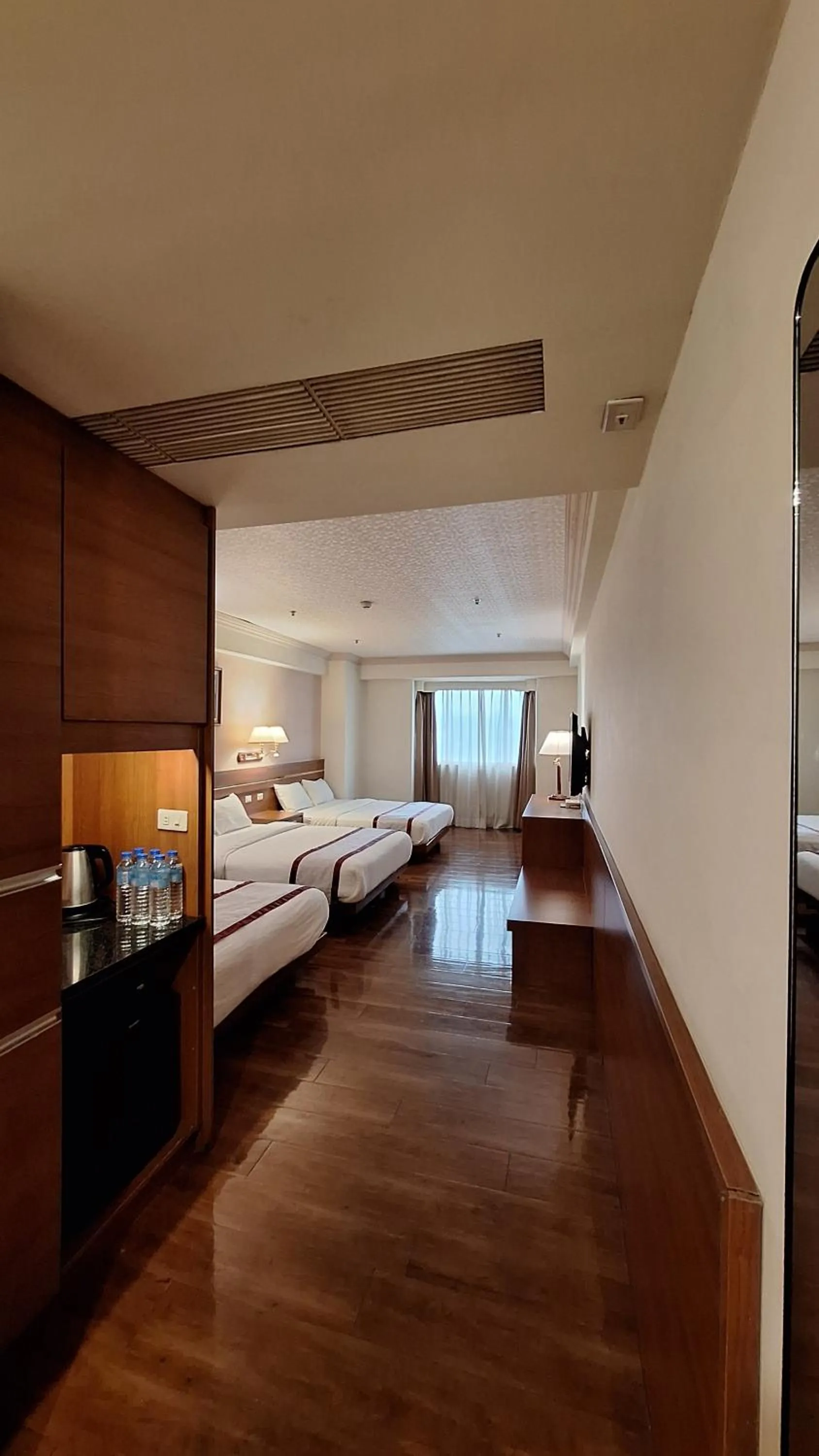 Bed in Cheng Pao Hotel