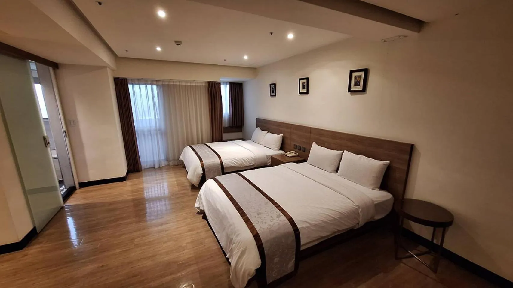 Bed in Cheng Pao Hotel