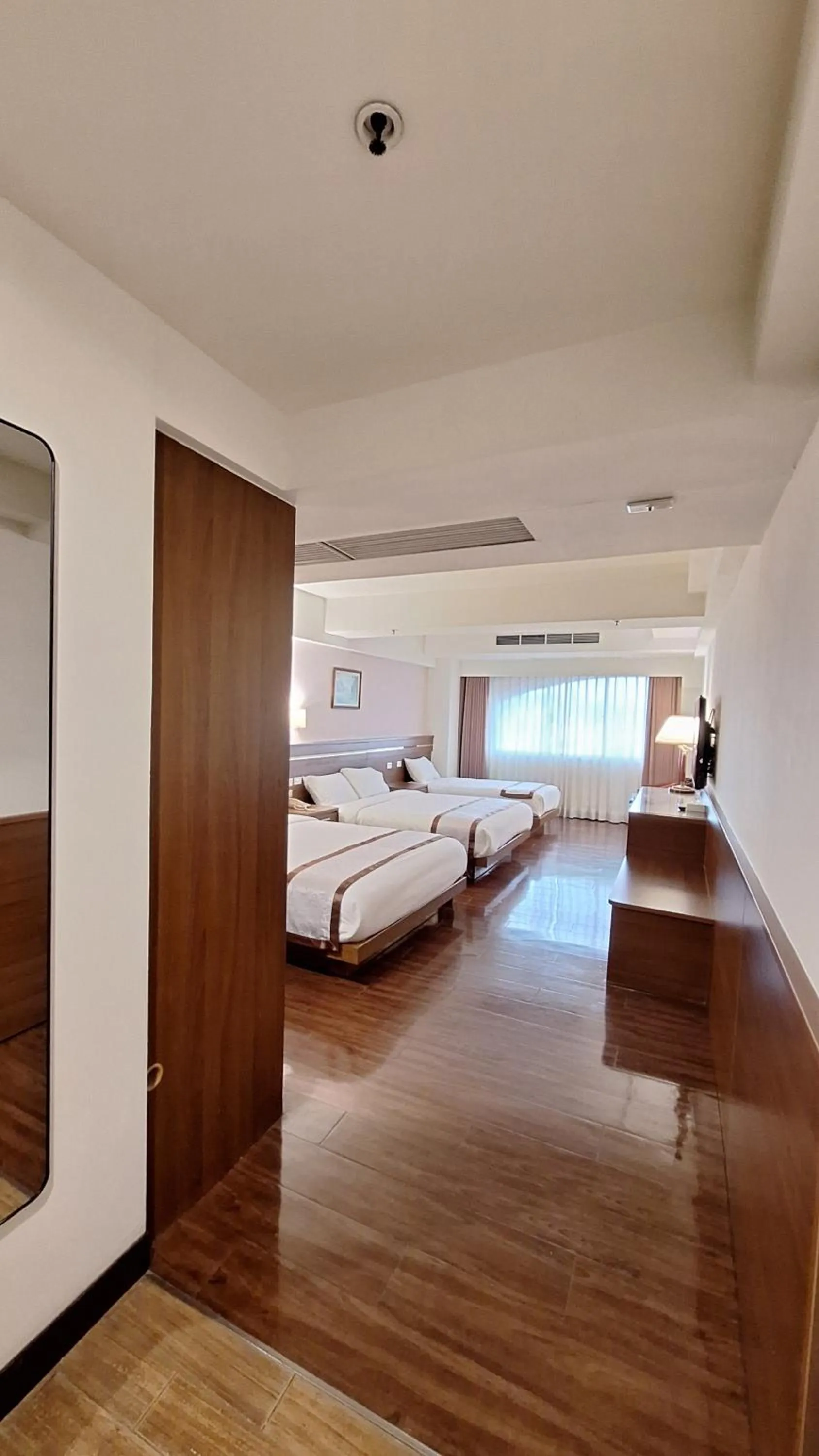 Bed in Cheng Pao Hotel