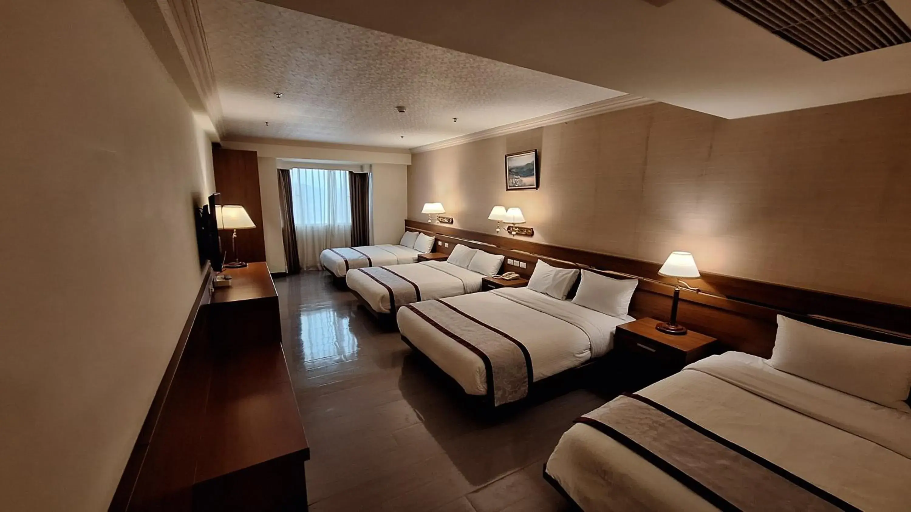 Bed in Cheng Pao Hotel Bed in Cheng Pao Hotel