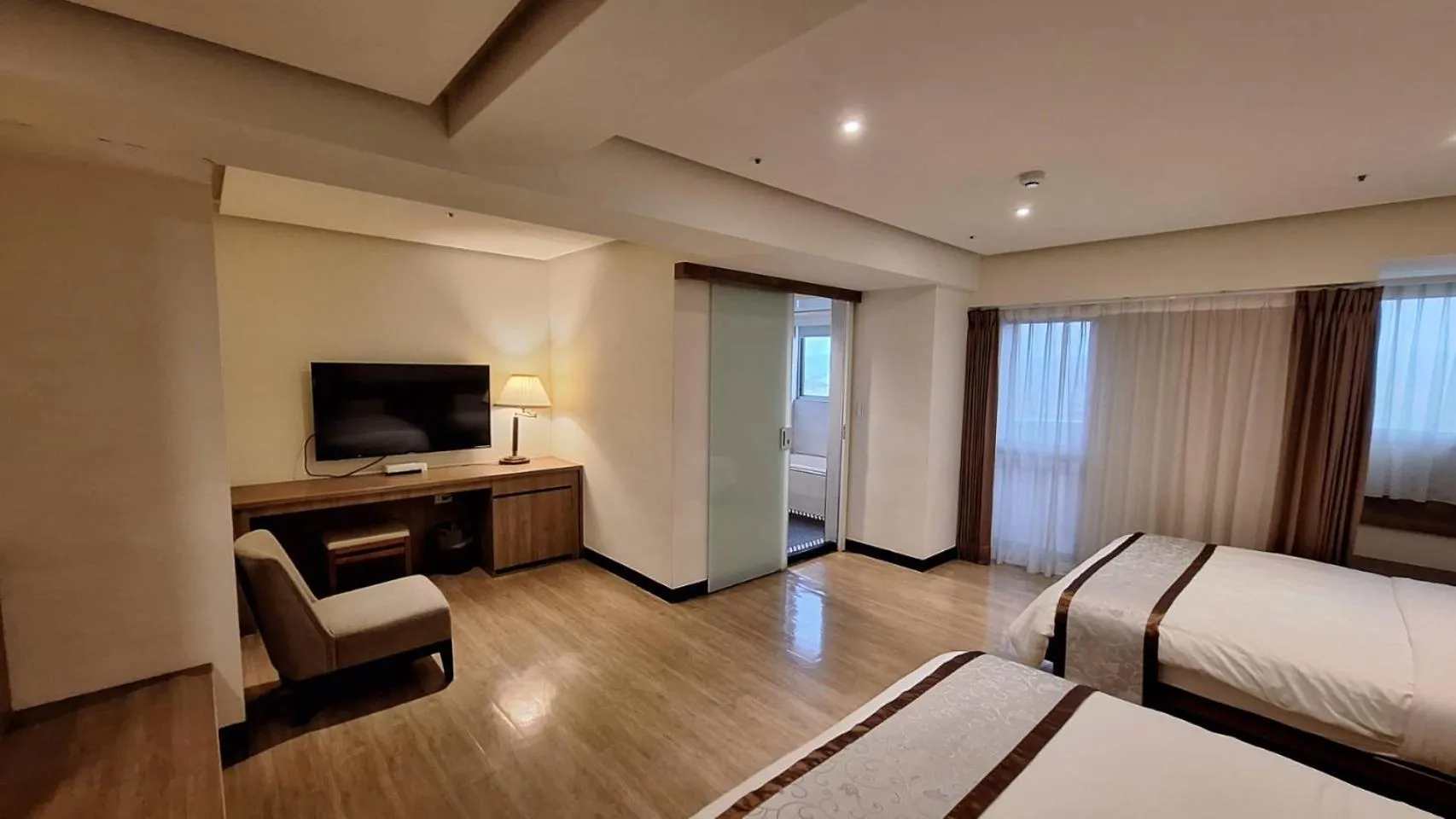 Bed in Cheng Pao Hotel