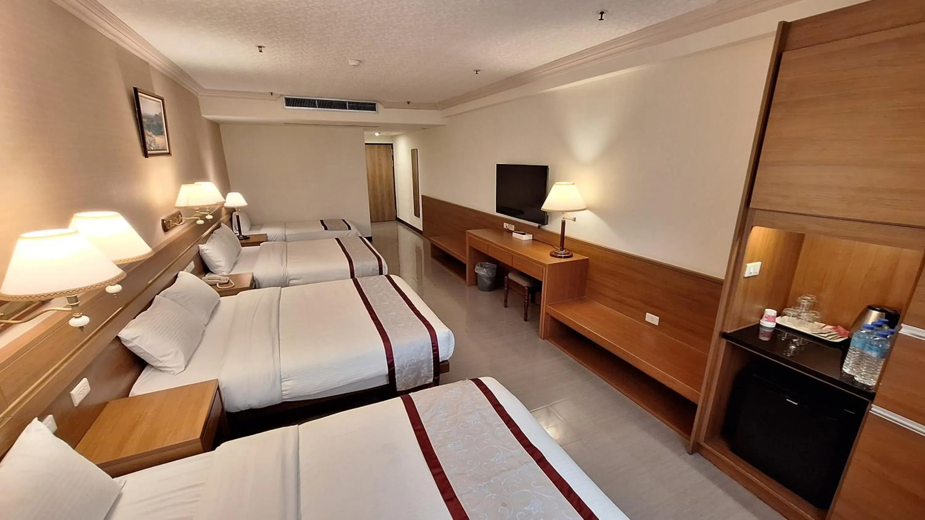 Bed in Cheng Pao Hotel