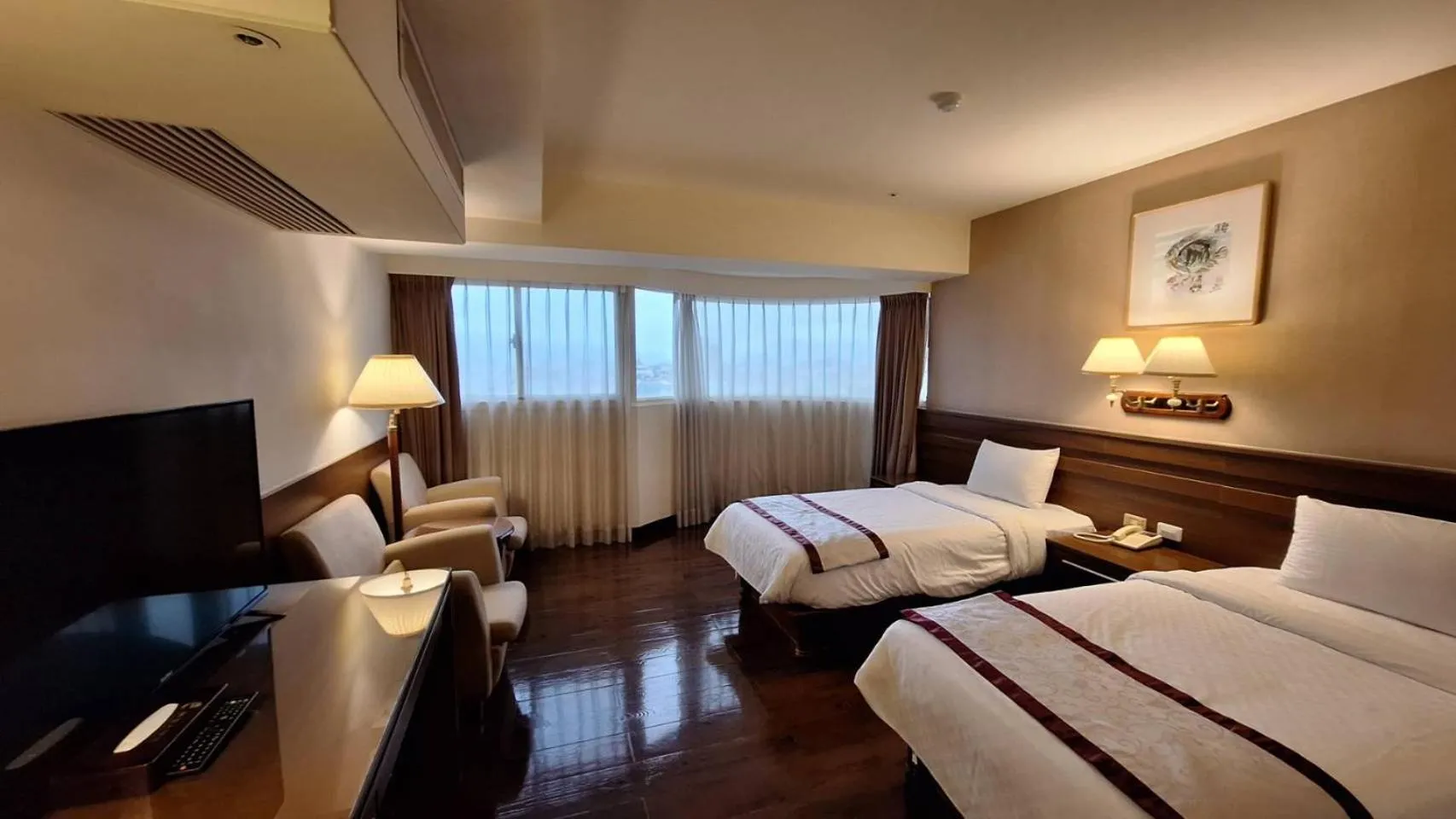 Bed in Cheng Pao Hotel