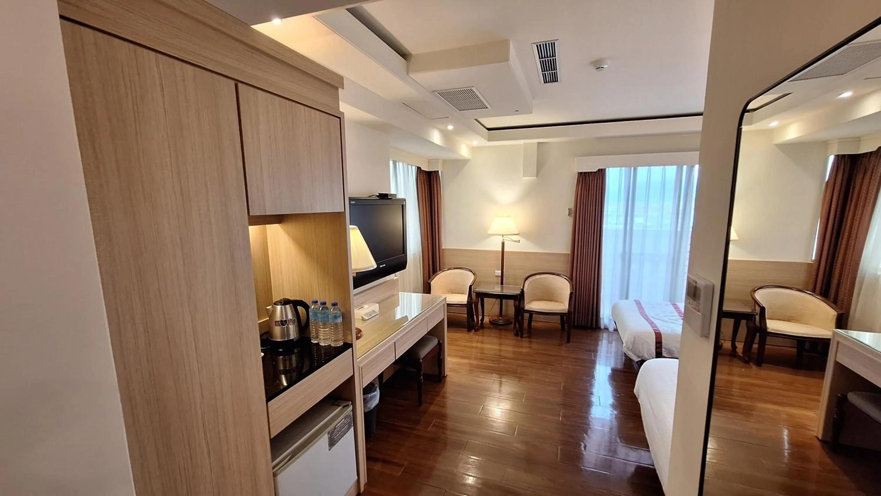 Bed in Cheng Pao Hotel