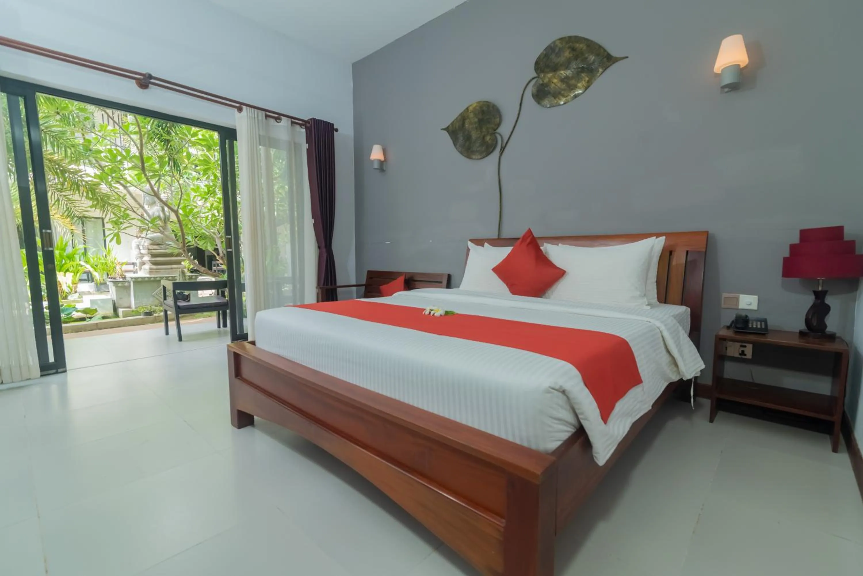 Bed in New Riverside Hotel