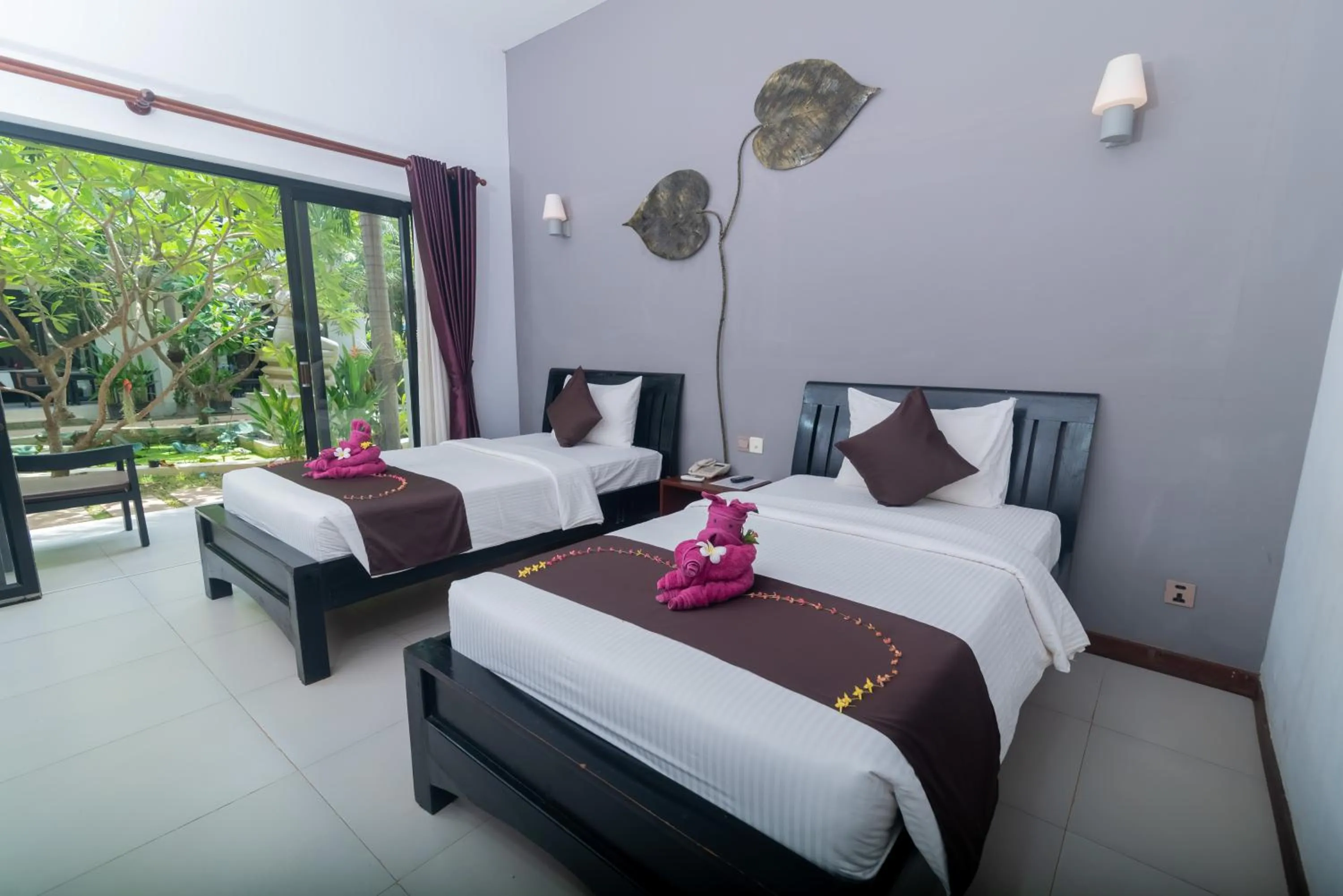 Bed in New Riverside Hotel