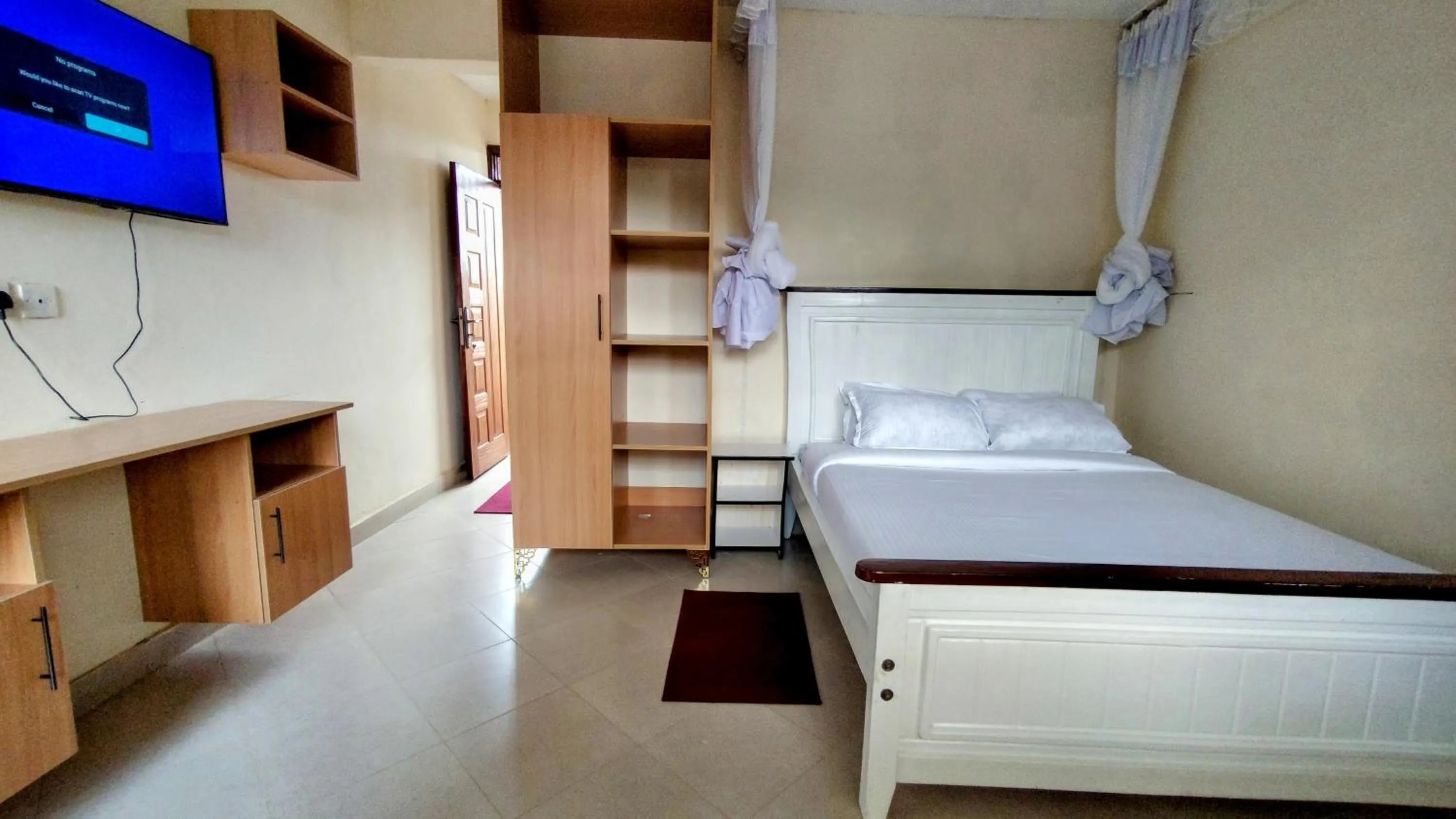 TV and multimedia, Bed in Kusi Hotel Kakamega