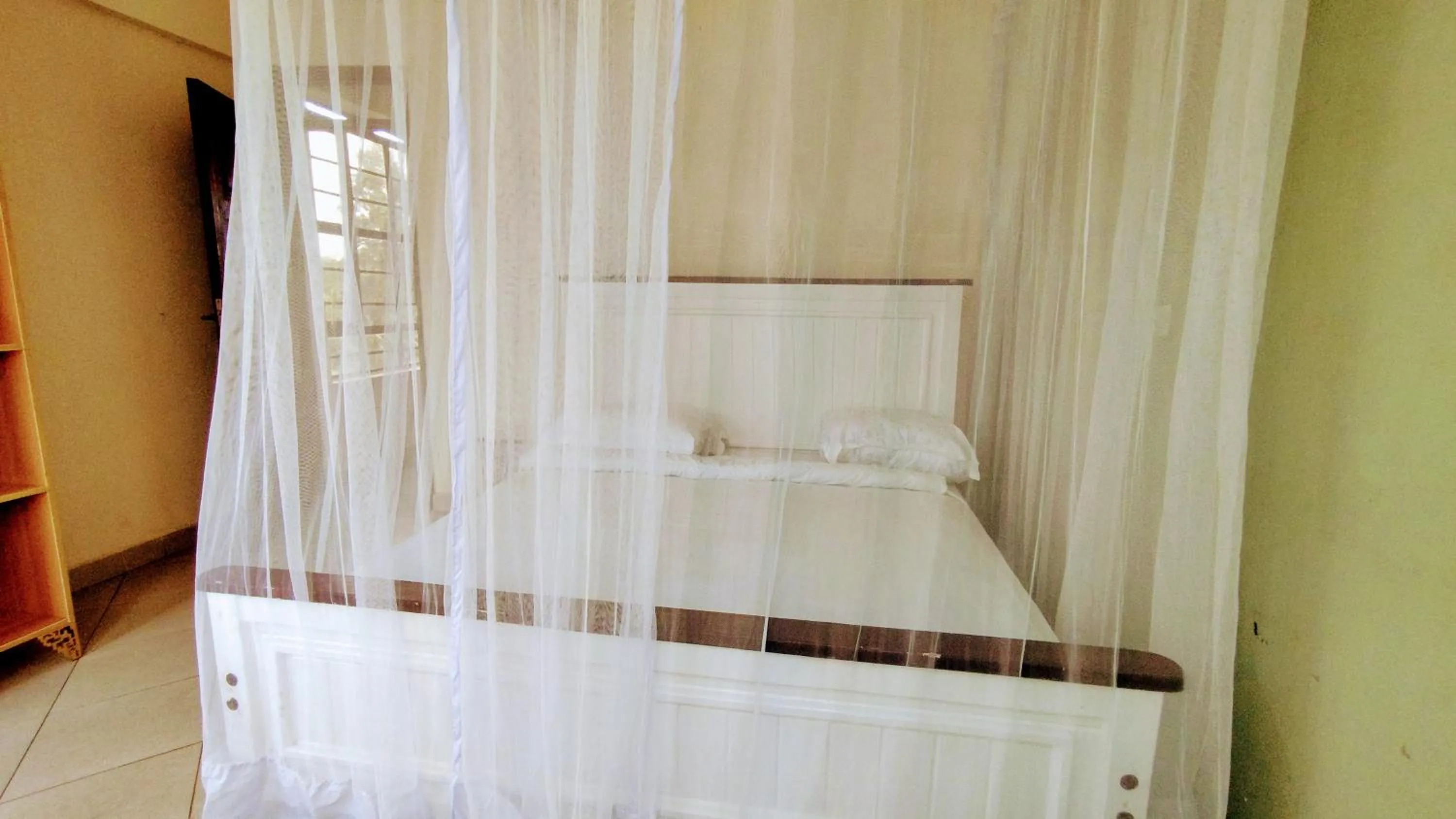 Bed in Kusi Hotel Kakamega