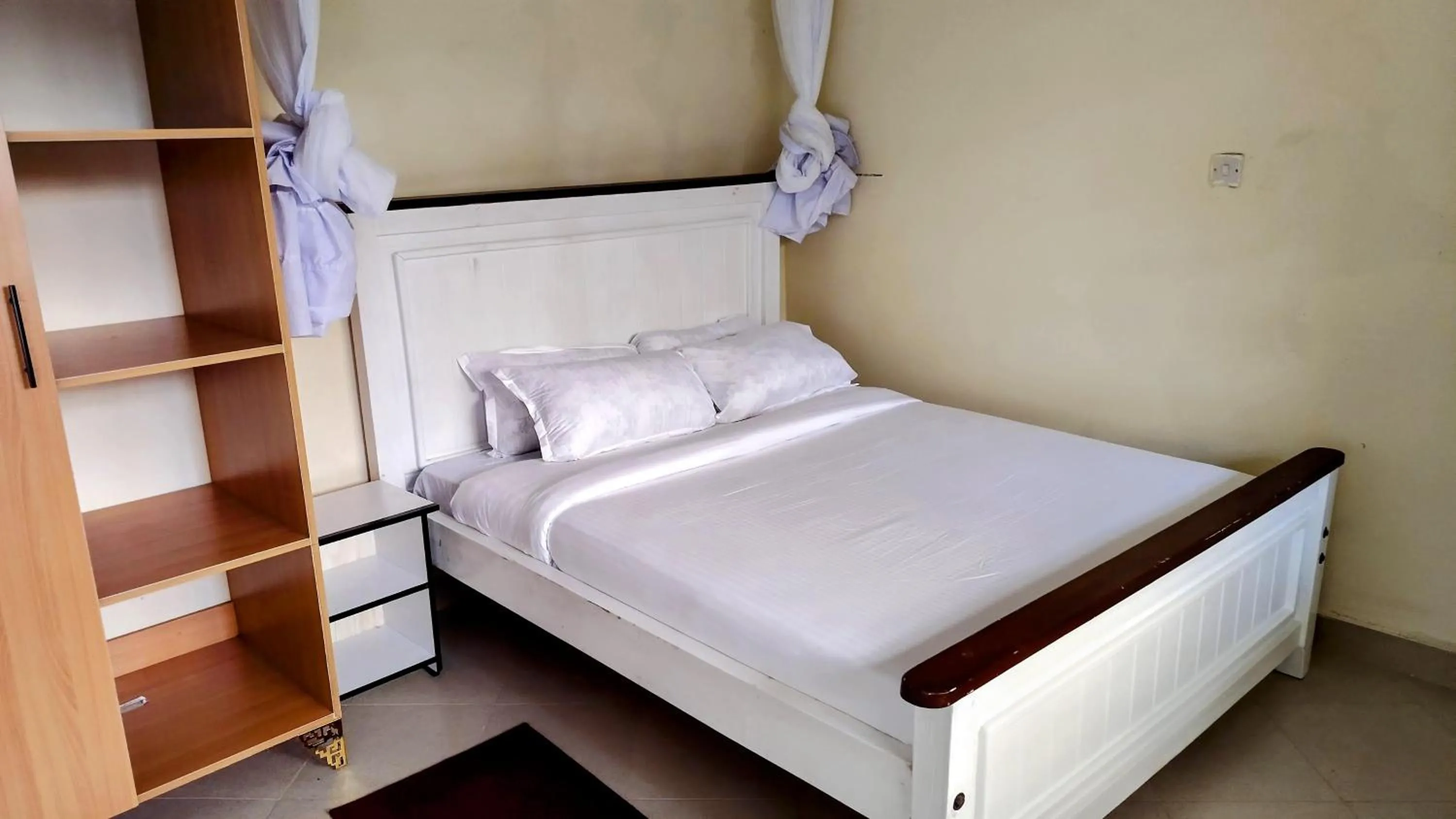 Bed in Kusi Hotel Kakamega
