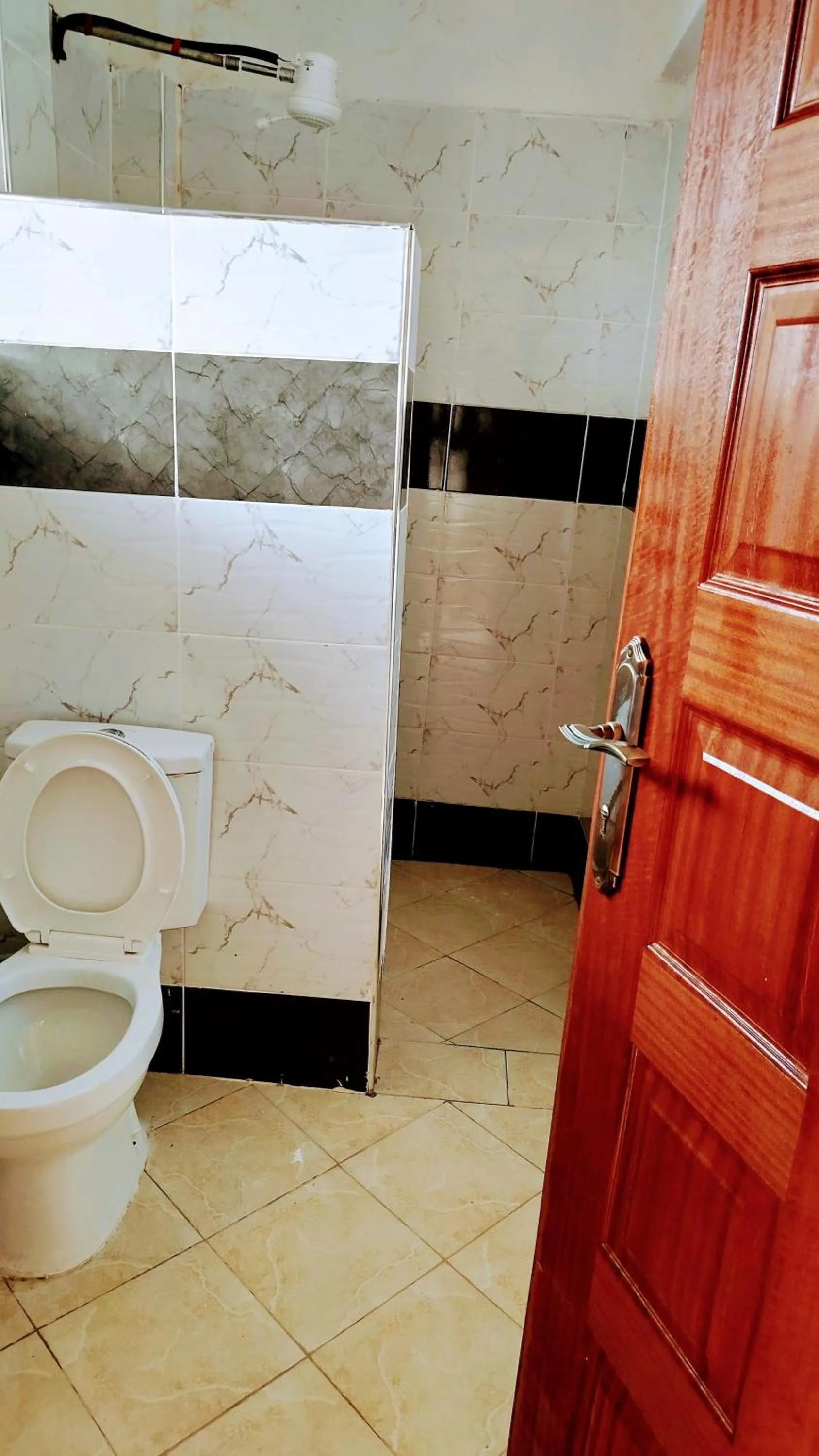 Shower in Kusi Hotel Kakamega