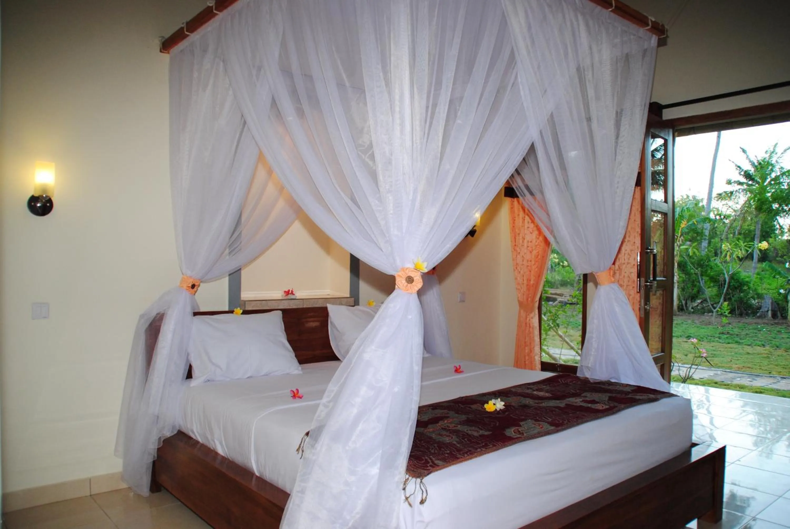 Photo of the whole room, Bed in Tiara Homestay Pemuteran Bali