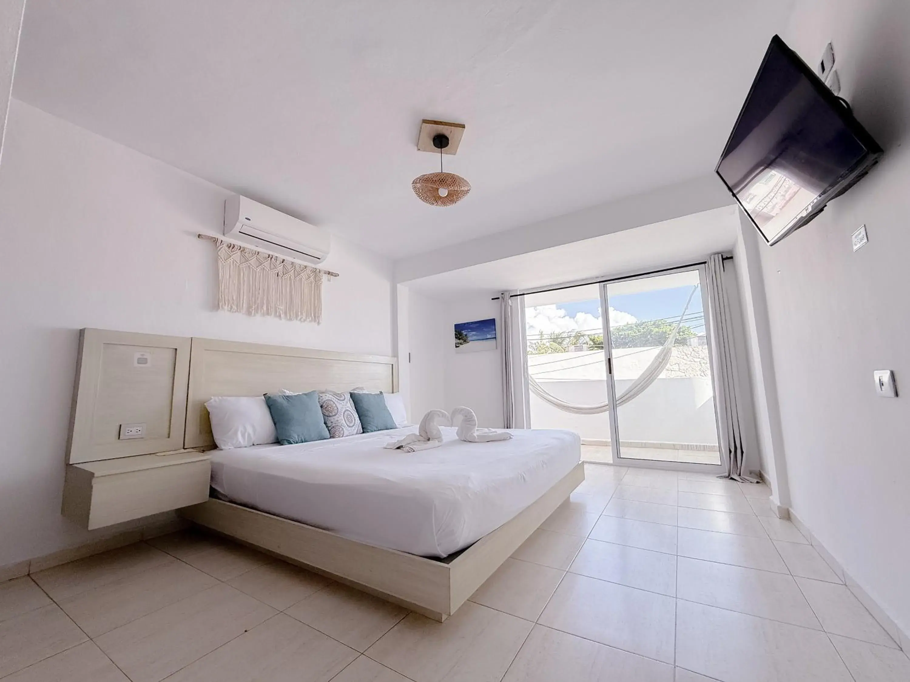 King Room with Balcony in Rustic Hotel Isla Mujeres King Room with Balcony in Rustic Hotel Isla Mujeres