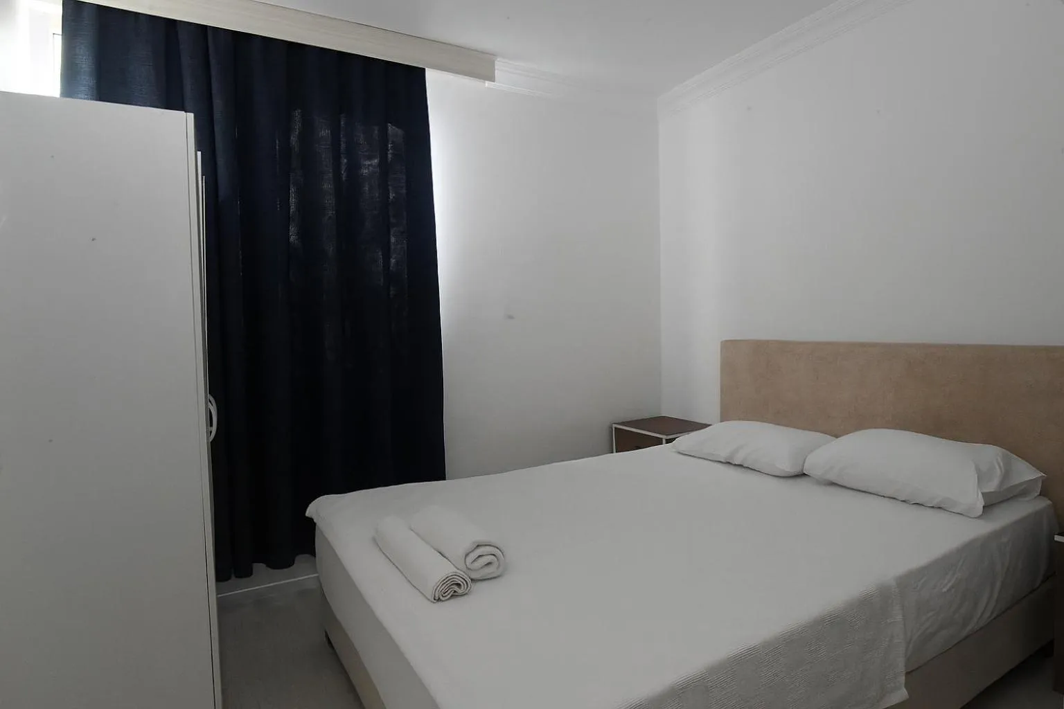 Bed in Hillside Apart House