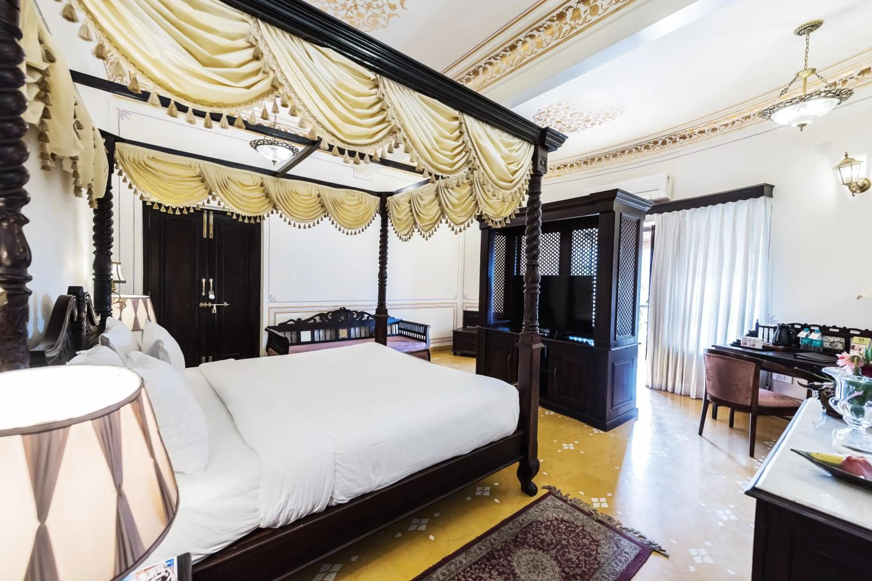 Bed in Grand Uniara A Heritage Hotel