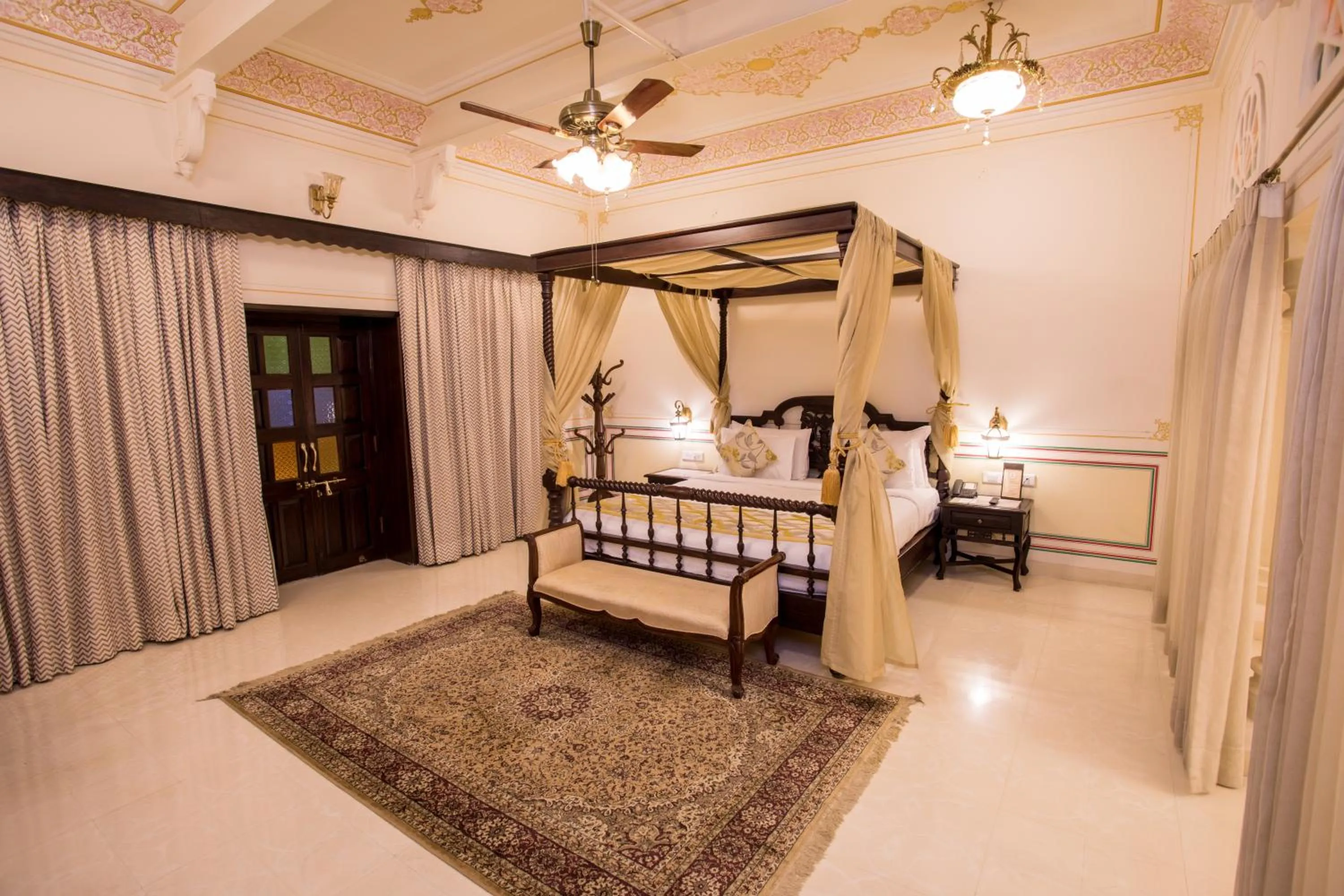 Bed in Grand Uniara A Heritage Hotel