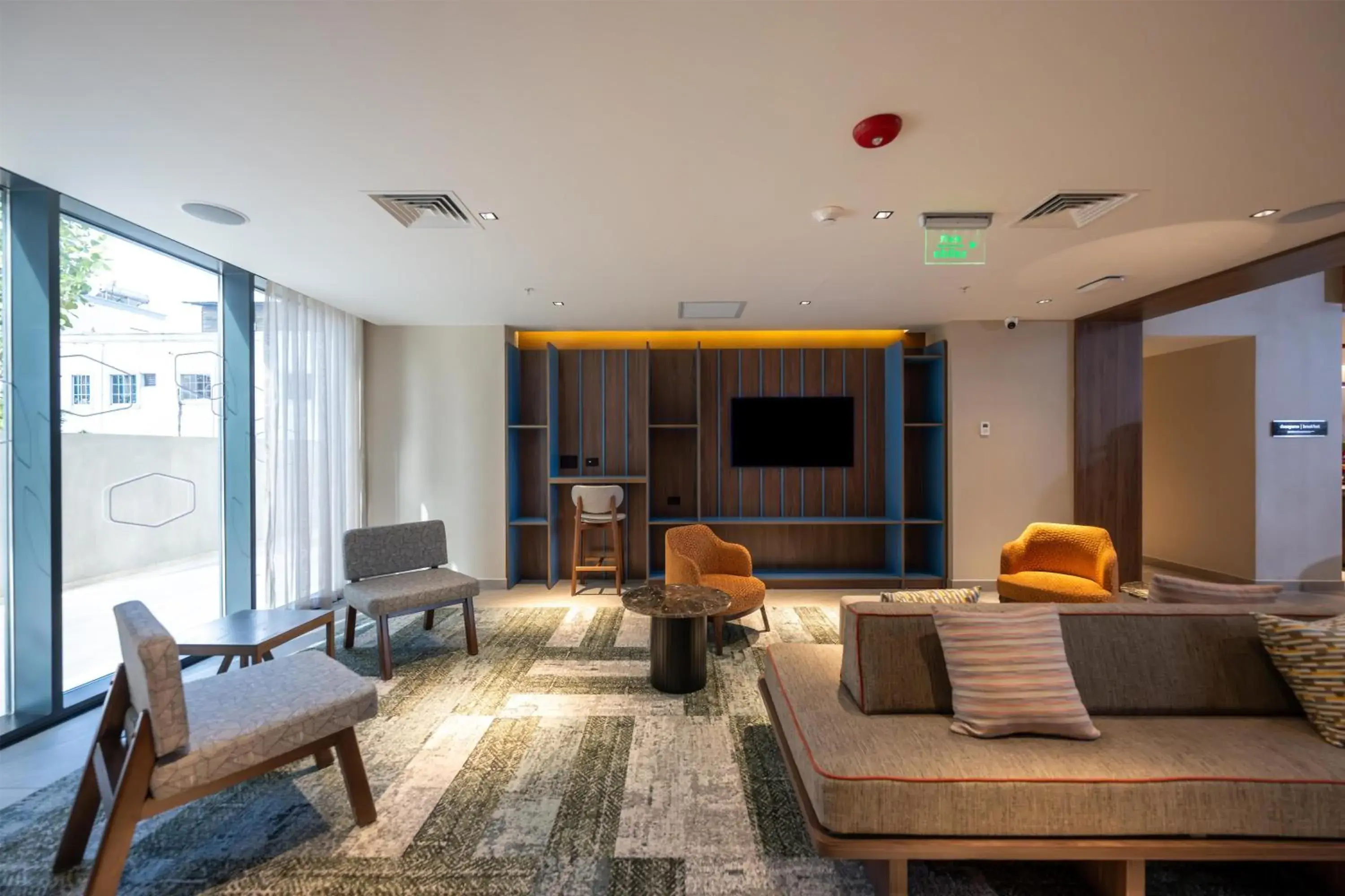 Lobby or reception in Hotel Hampton By Hilton Santiago De Los Caballeros Lobby or reception in Hotel Hampton By Hilton Santiago De Los Caballeros