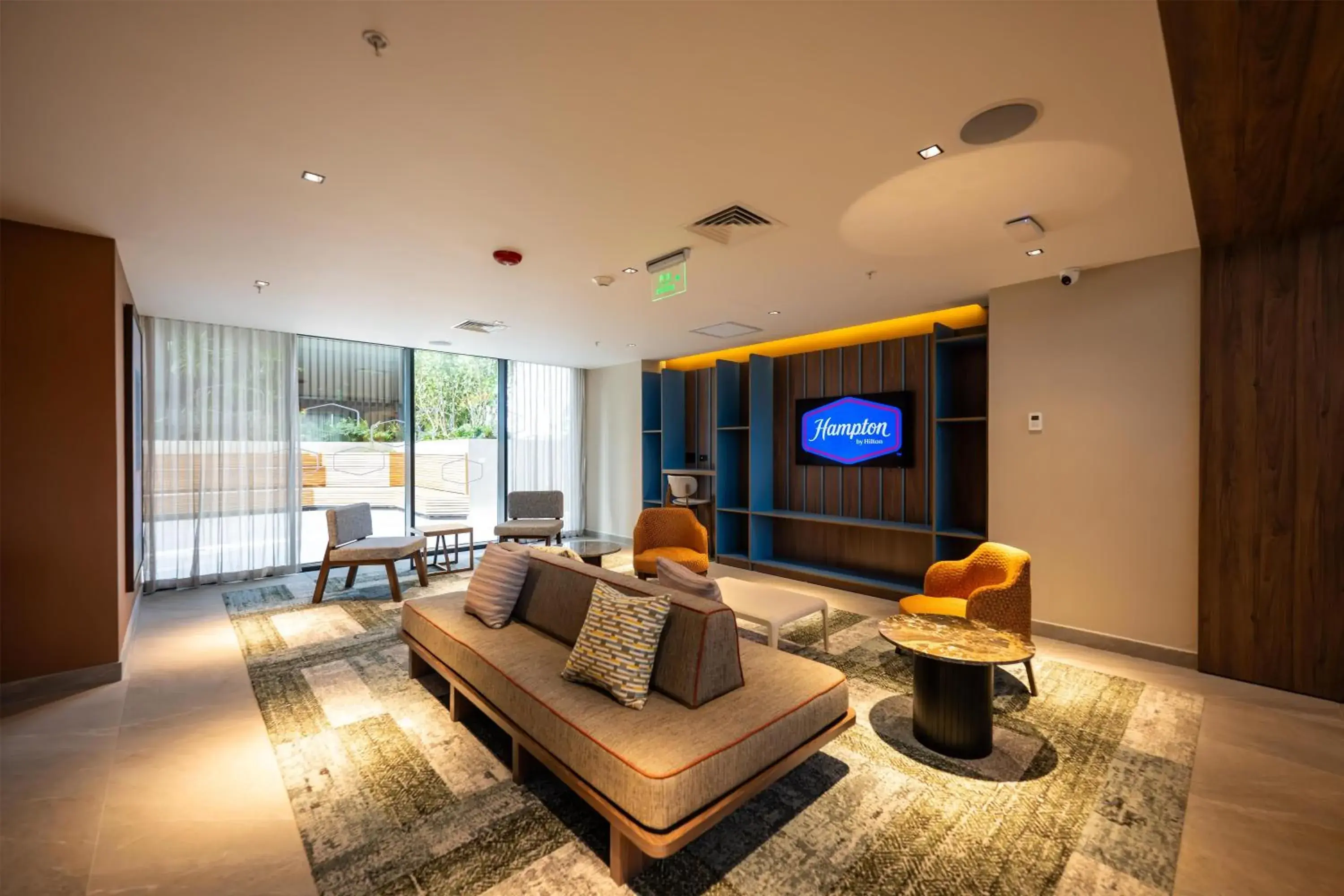 Lobby or reception in Hotel Hampton By Hilton Santiago De Los Caballeros Lobby or reception in Hotel Hampton By Hilton Santiago De Los Caballeros