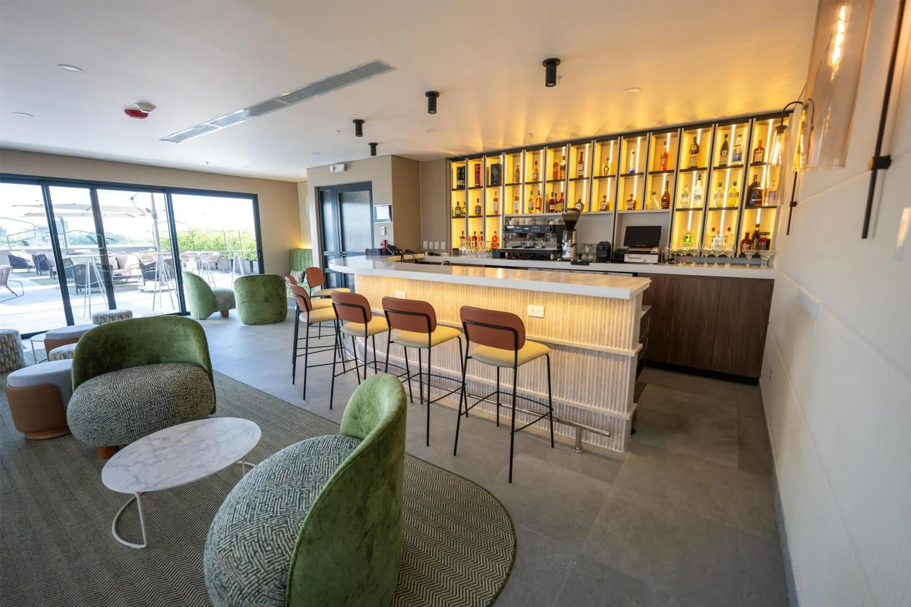 Lounge or bar in Hotel Hampton By Hilton Santiago De Los Caballeros Lounge or bar in Hotel Hampton By Hilton Santiago De Los Caballeros