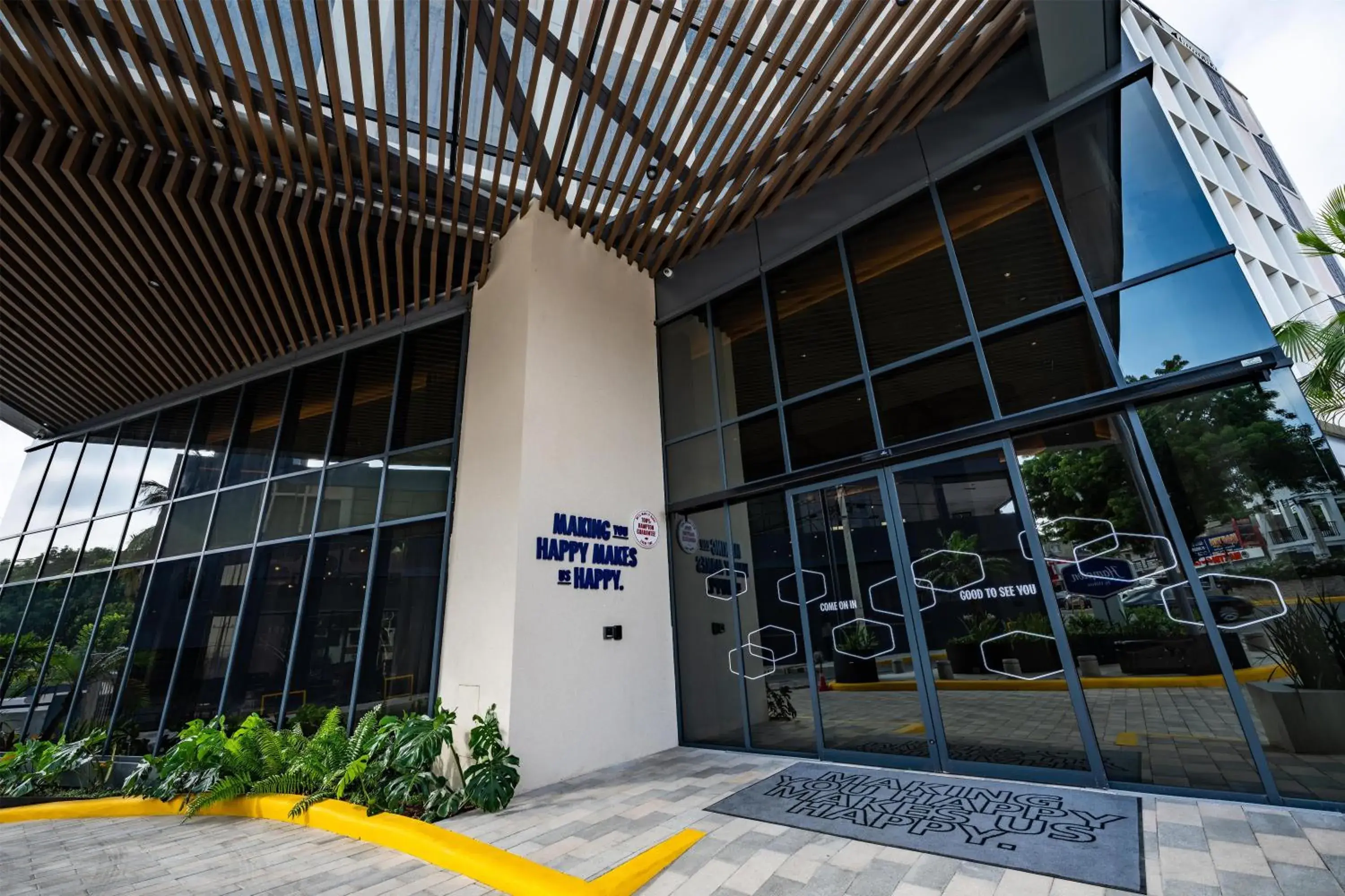 Property building in Hotel Hampton By Hilton Santiago De Los Caballeros Property building in Hotel Hampton By Hilton Santiago De Los Caballeros