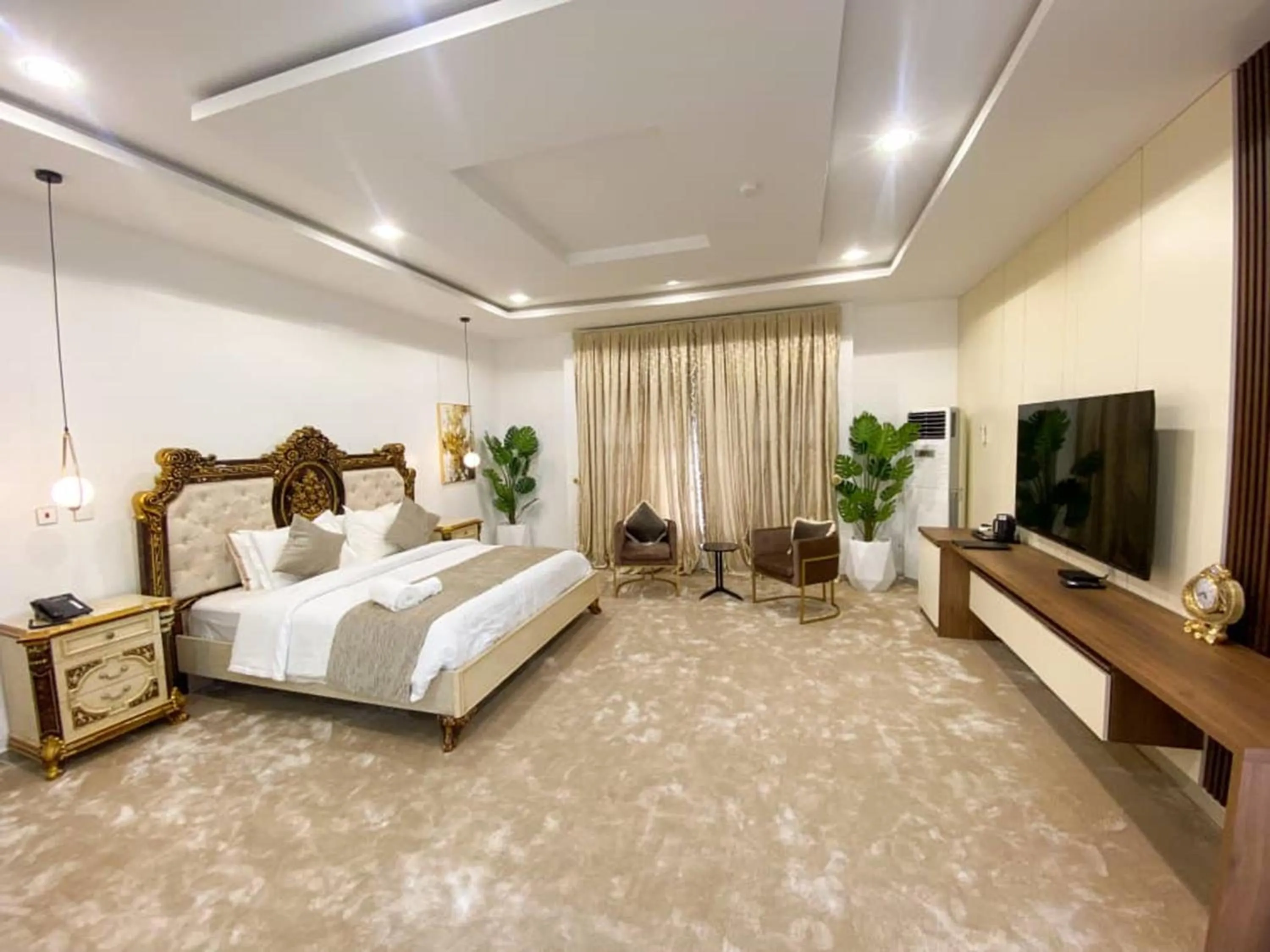 Bed in UrbanEdge Hotel