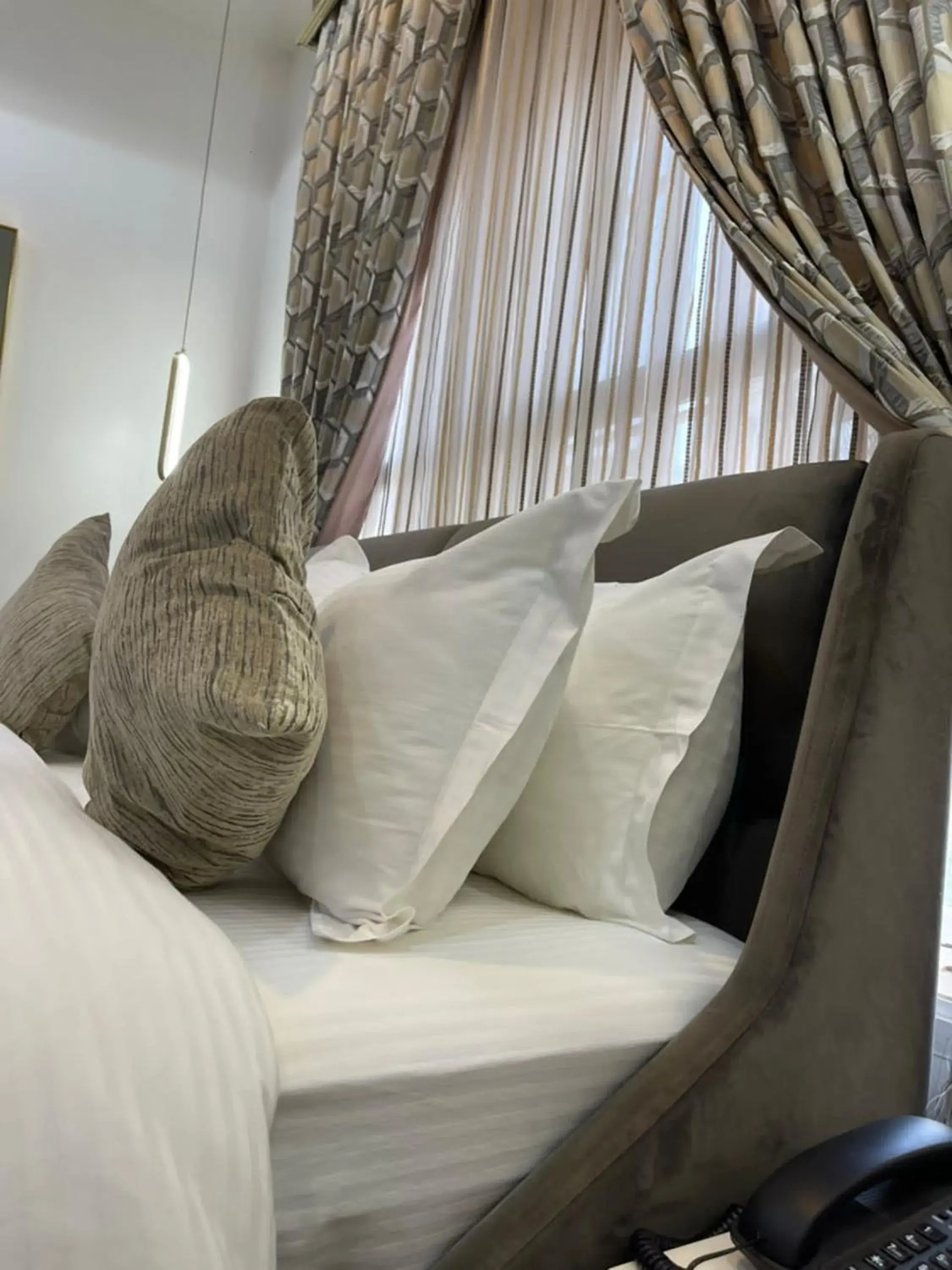 Bed in UrbanEdge Hotel Bed in UrbanEdge Hotel