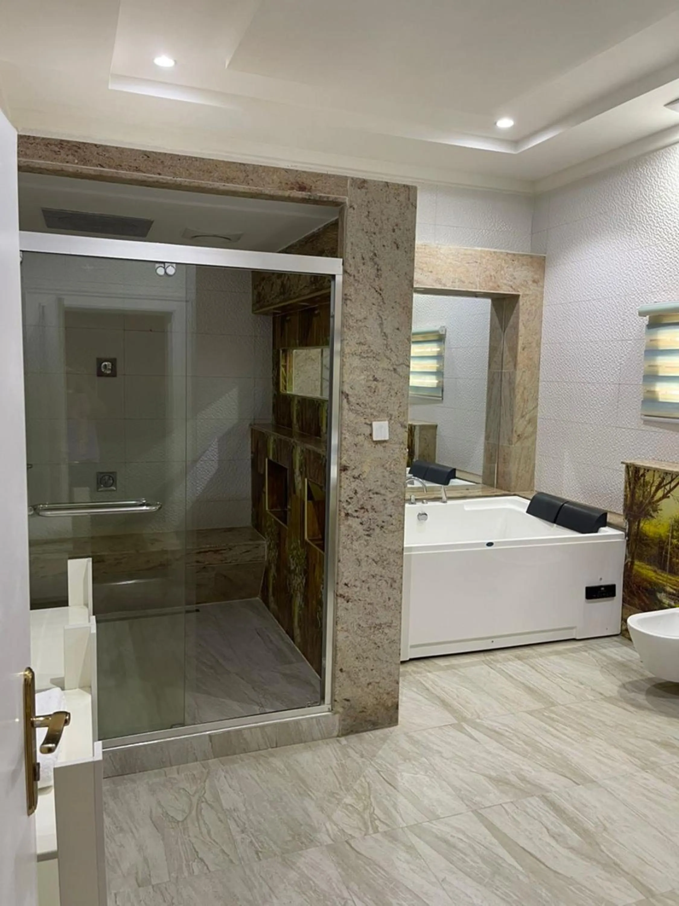 Bed in UrbanEdge Hotel