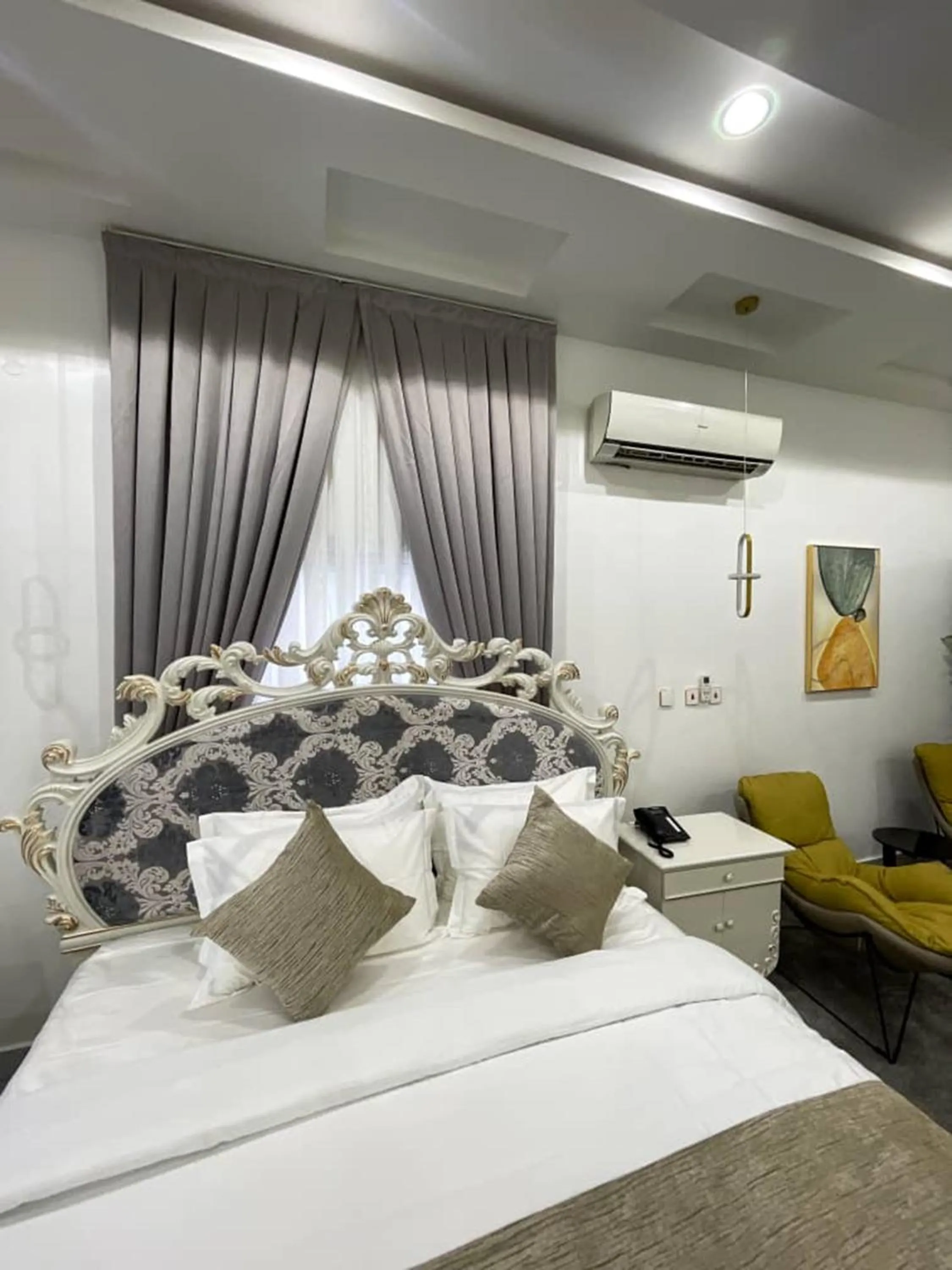 Bed in UrbanEdge Hotel