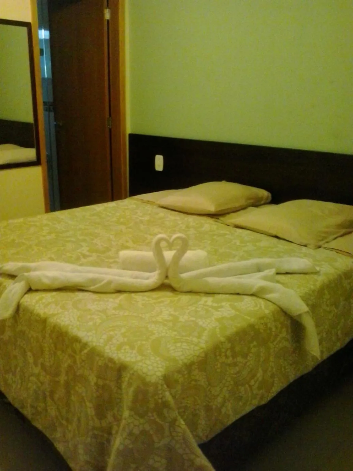 Bed in Portal Palace Hotel