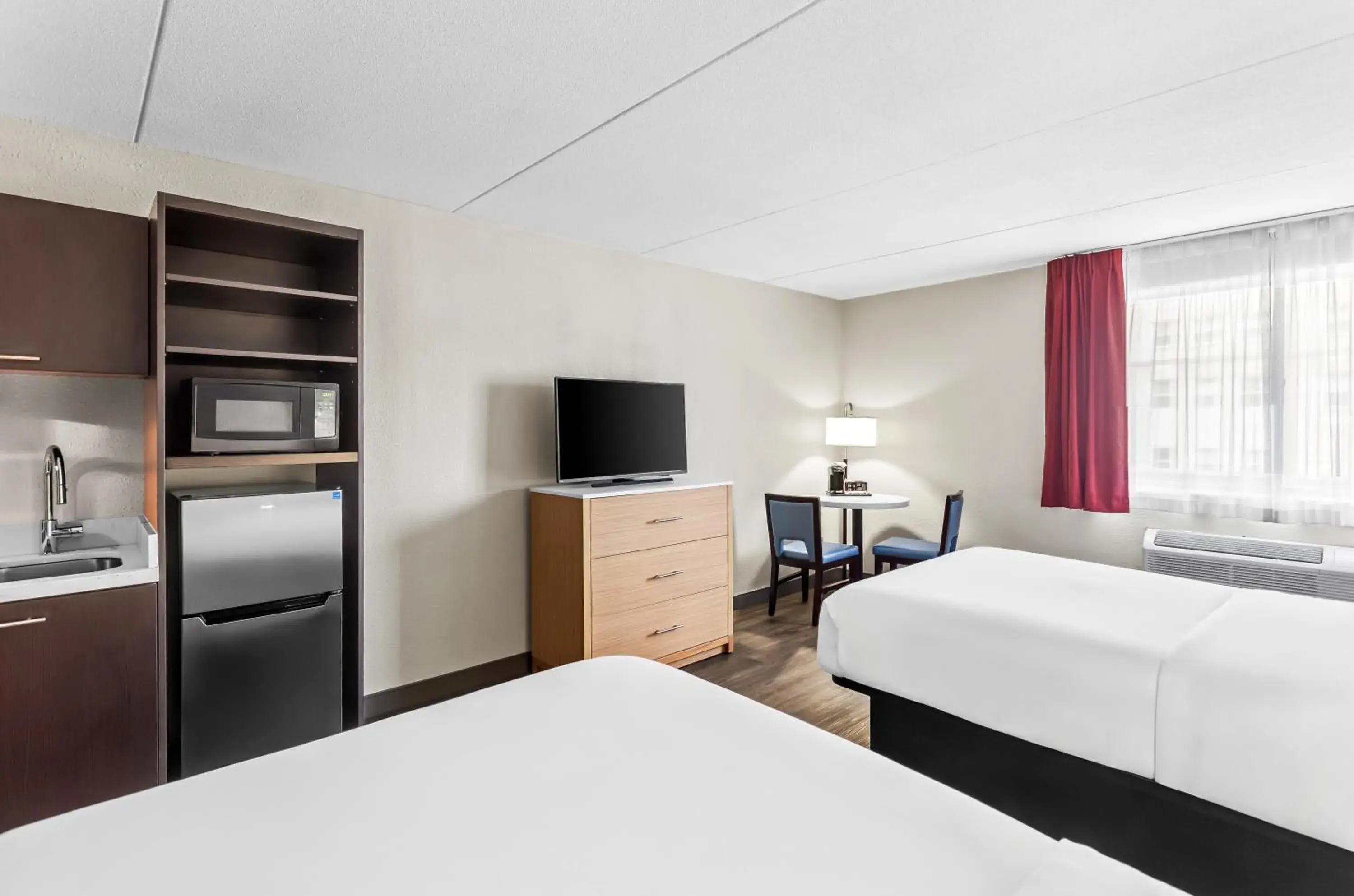 Bed in Suburban Studios Charleston - Civic Center Bed in Suburban Studios Charleston - Civic Center