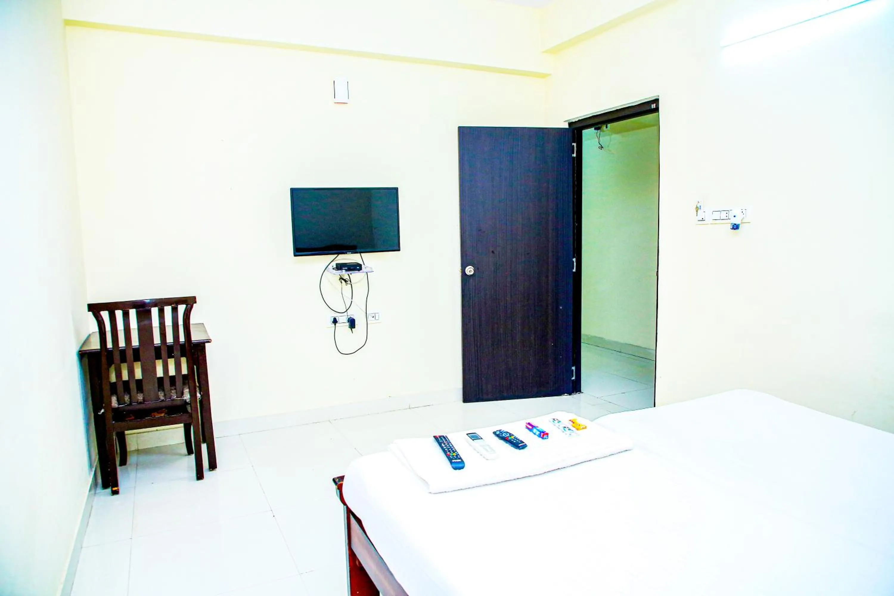 Bed in Sri Ramanjaneya Nilayam