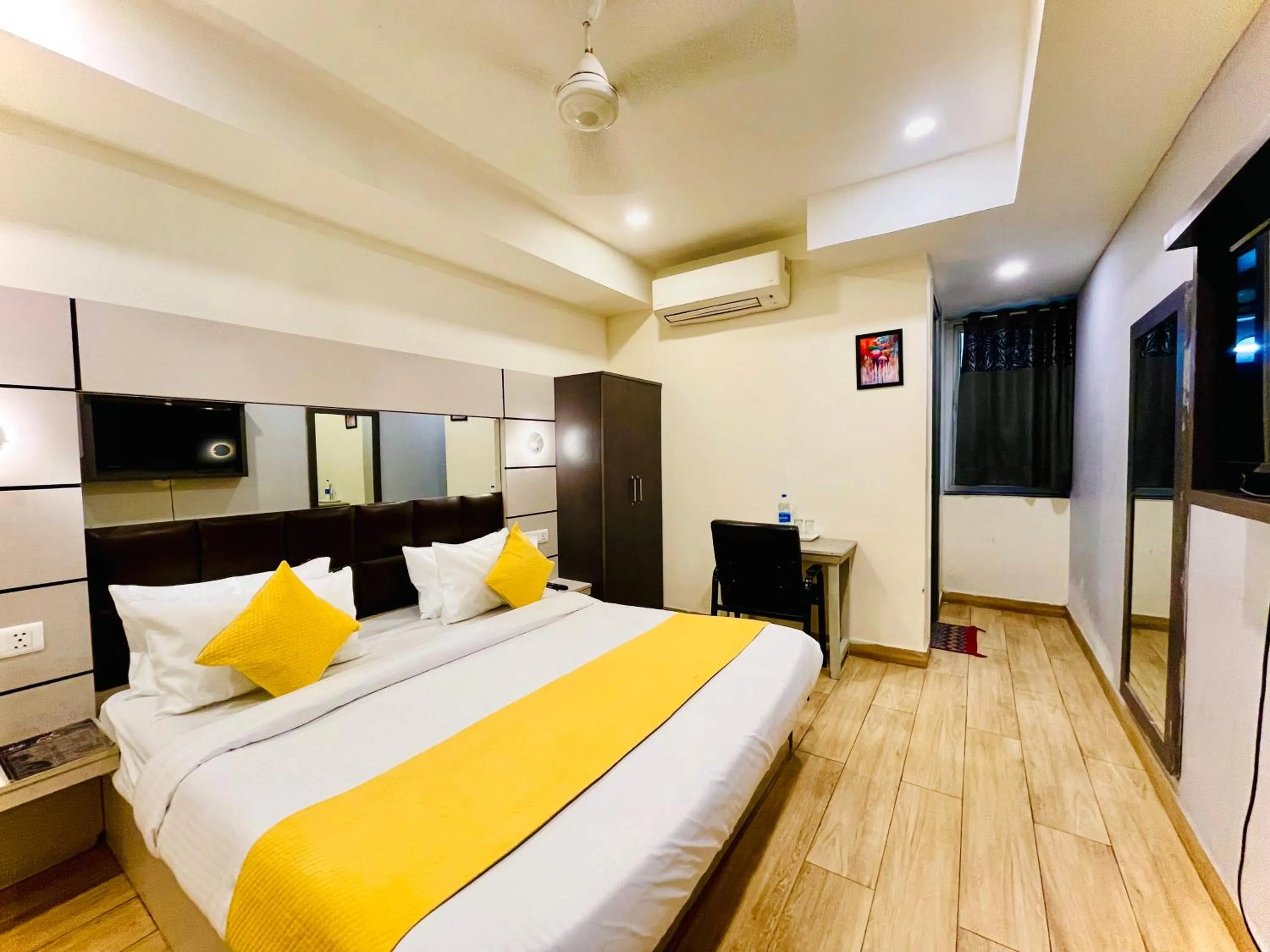 Bed in Hotel Royal Saffron by Majesta Stays