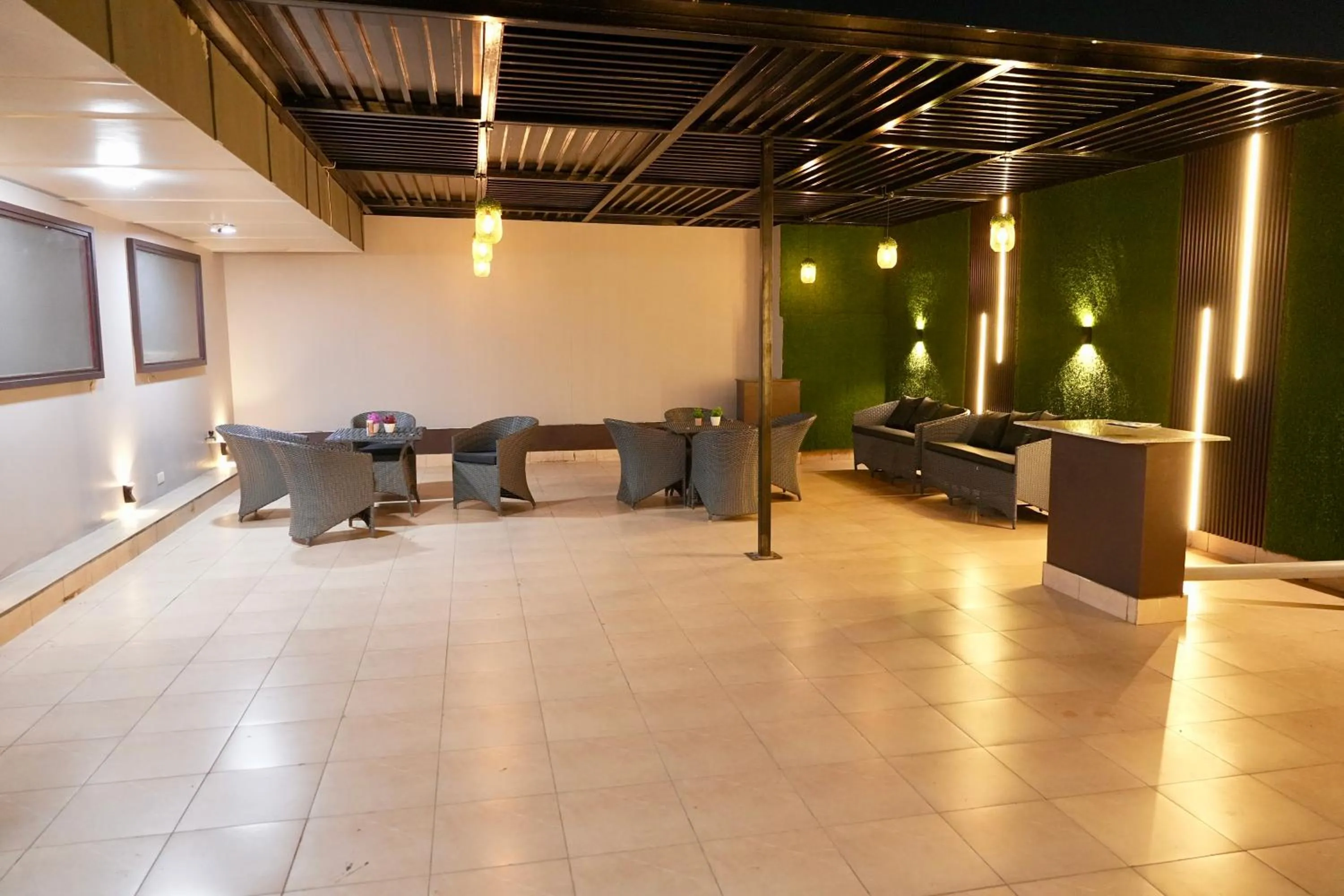 Seating area in Hotel Royal Saffron by Majesta Stays