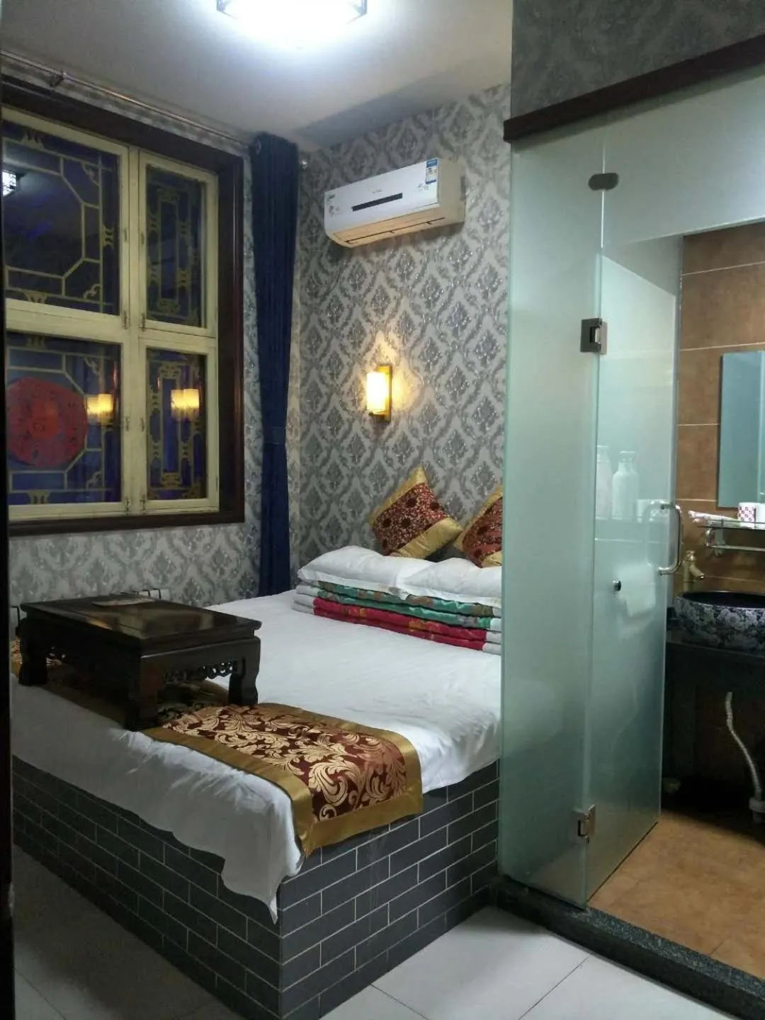 Bed in Pingyao Jiaxin Guesthouse