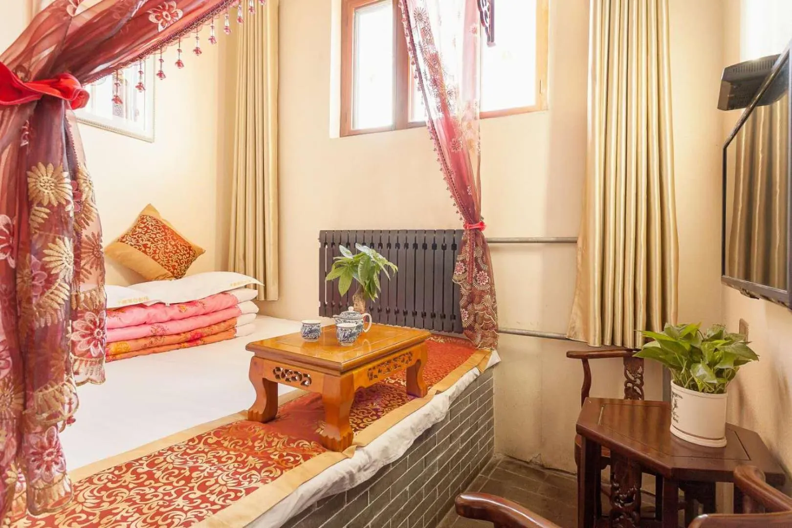 Bed in Pingyao Jiaxin Guesthouse