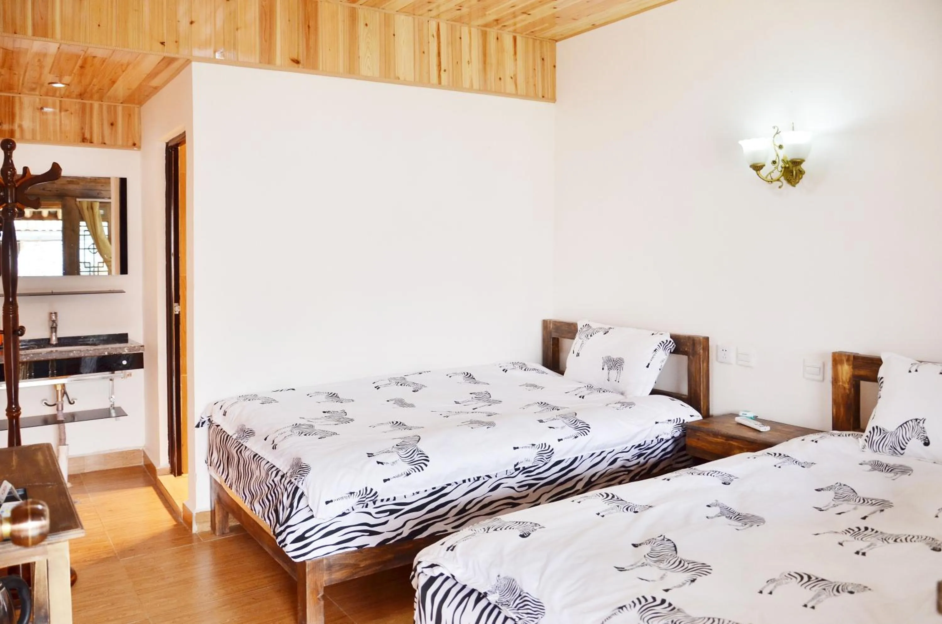 Bed in Tourist Courtyard Hotel