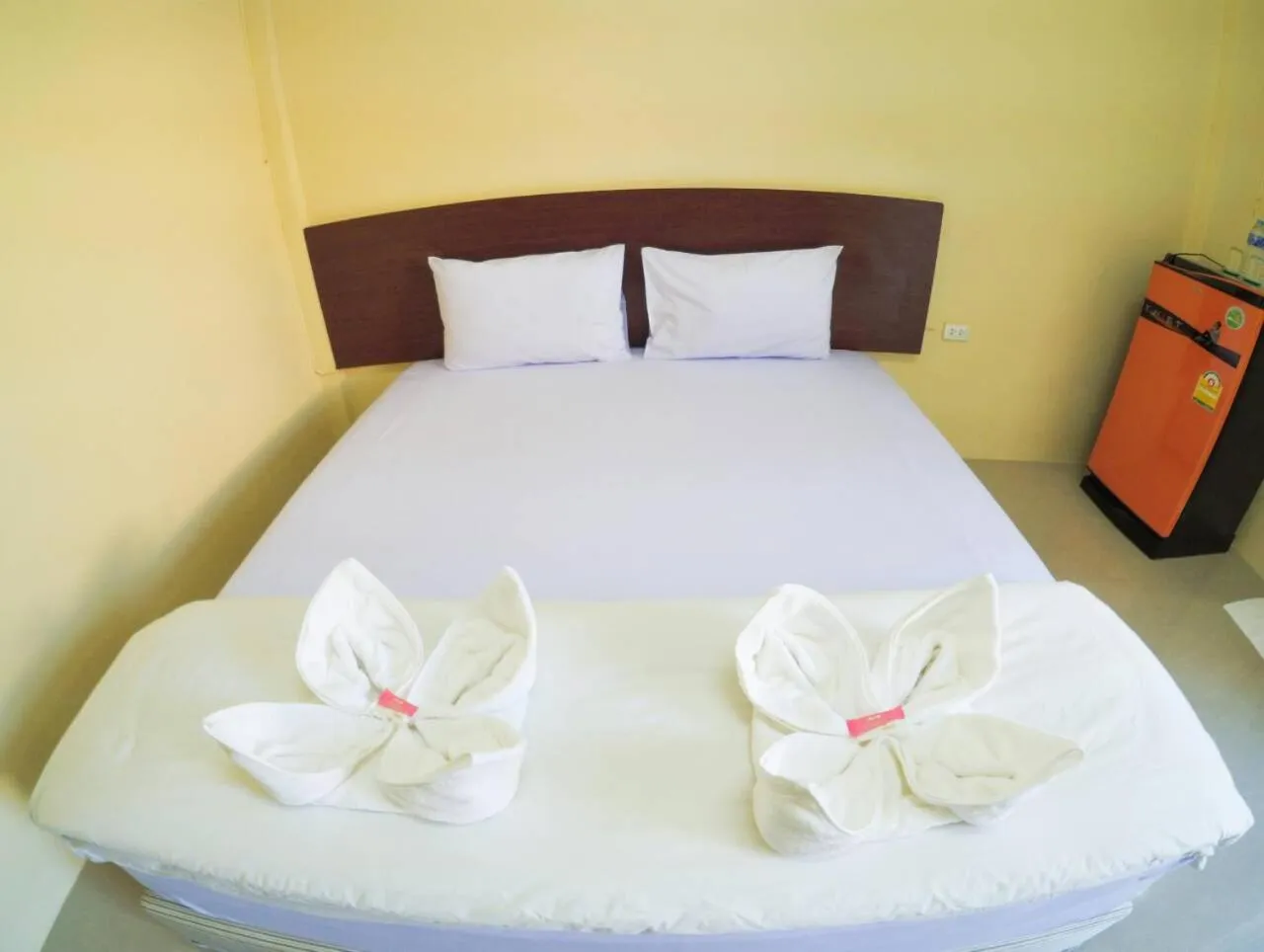 Bed in Wansiri Mansion