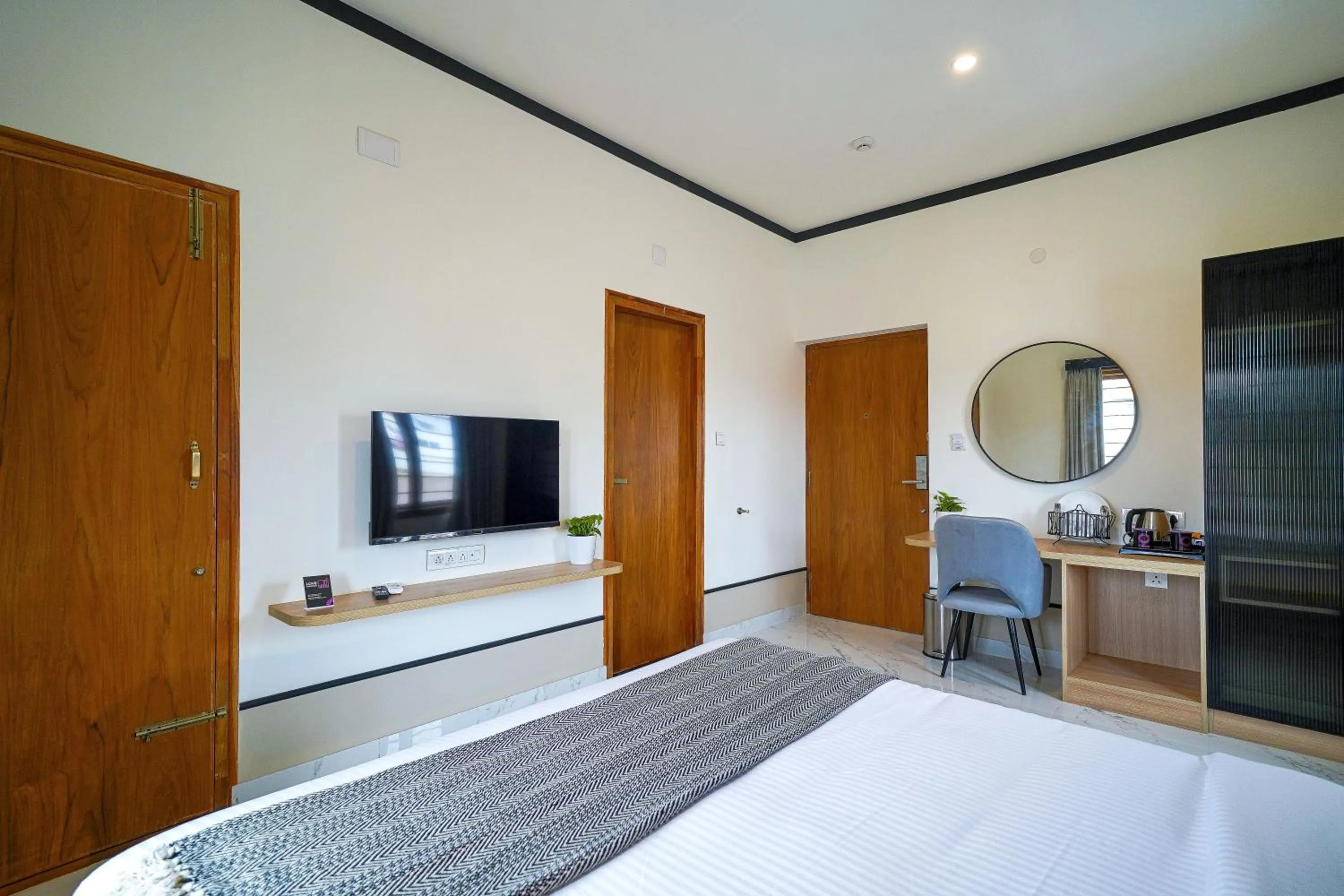 Bed in Olive Hotel Chikkamagalur by Embassy Group